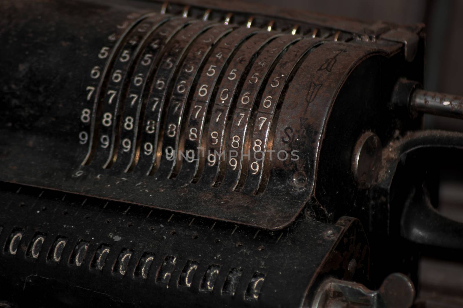 An old vintage cash register with lots of numbers by arvidnorberg