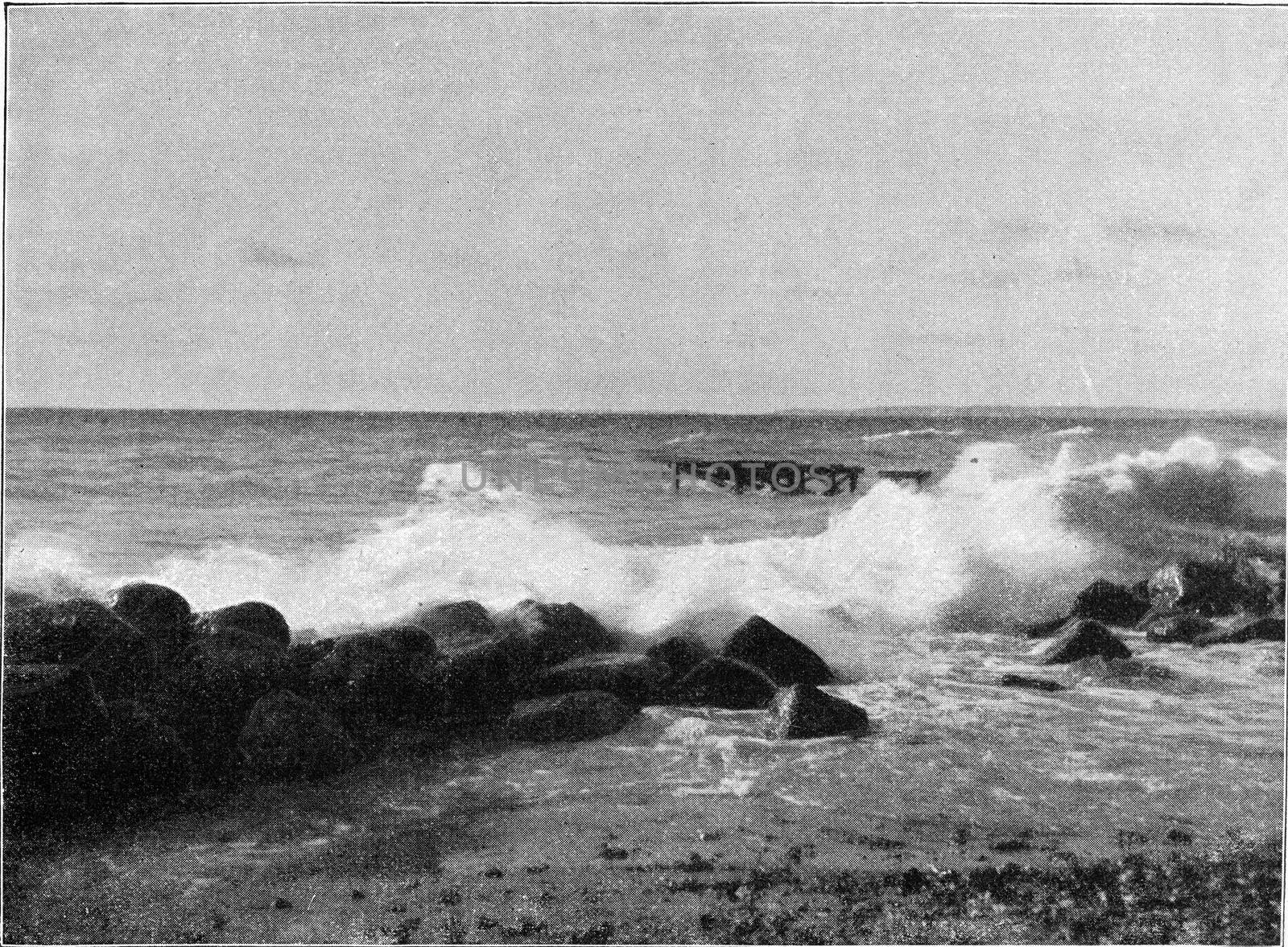 Breakers on a flat coast, vintage engraved illustration. From the Universe and Humanity, 1910.
