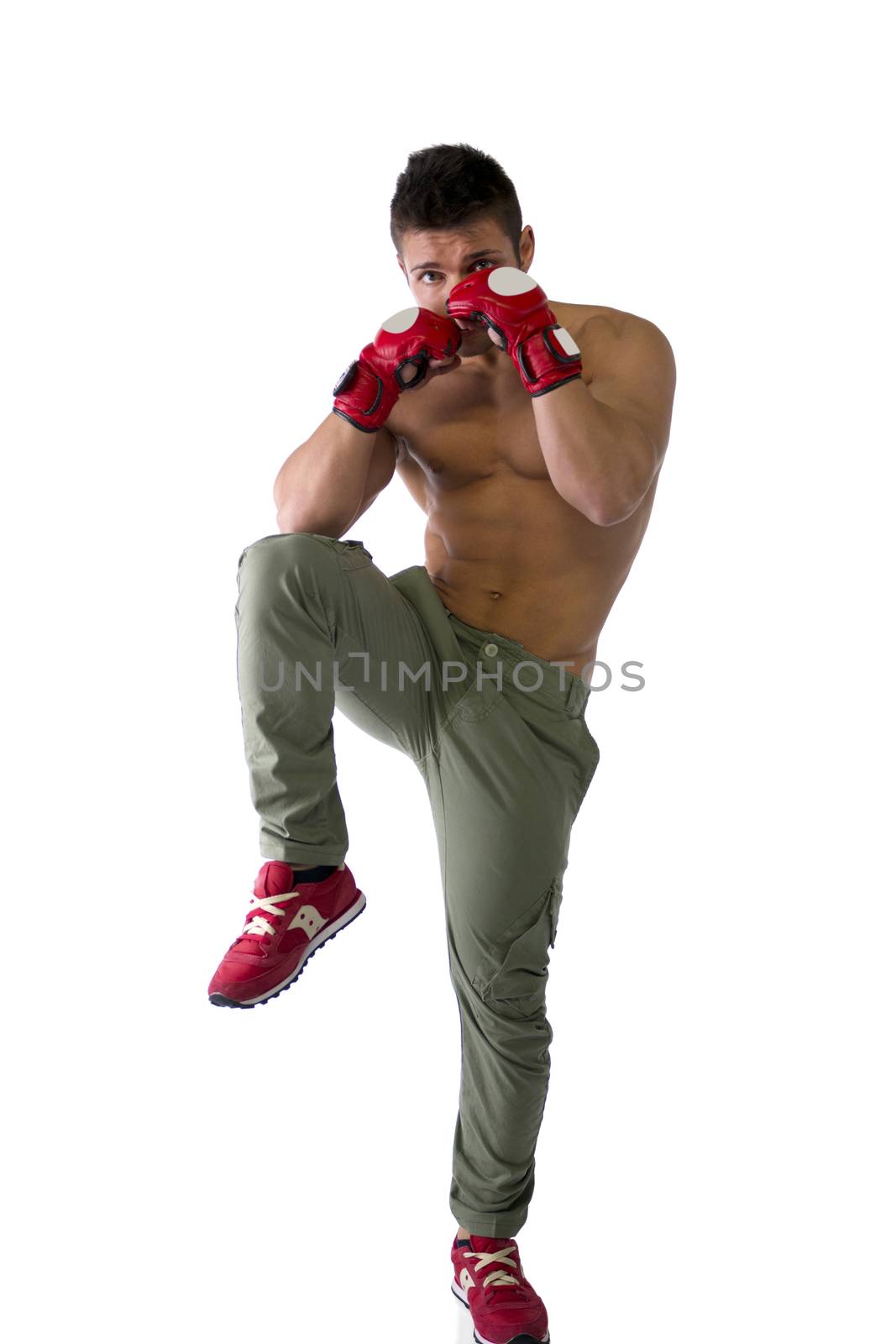 Muscular shirtless young man with mixed martial arts gloves MMA , profile view, isolated