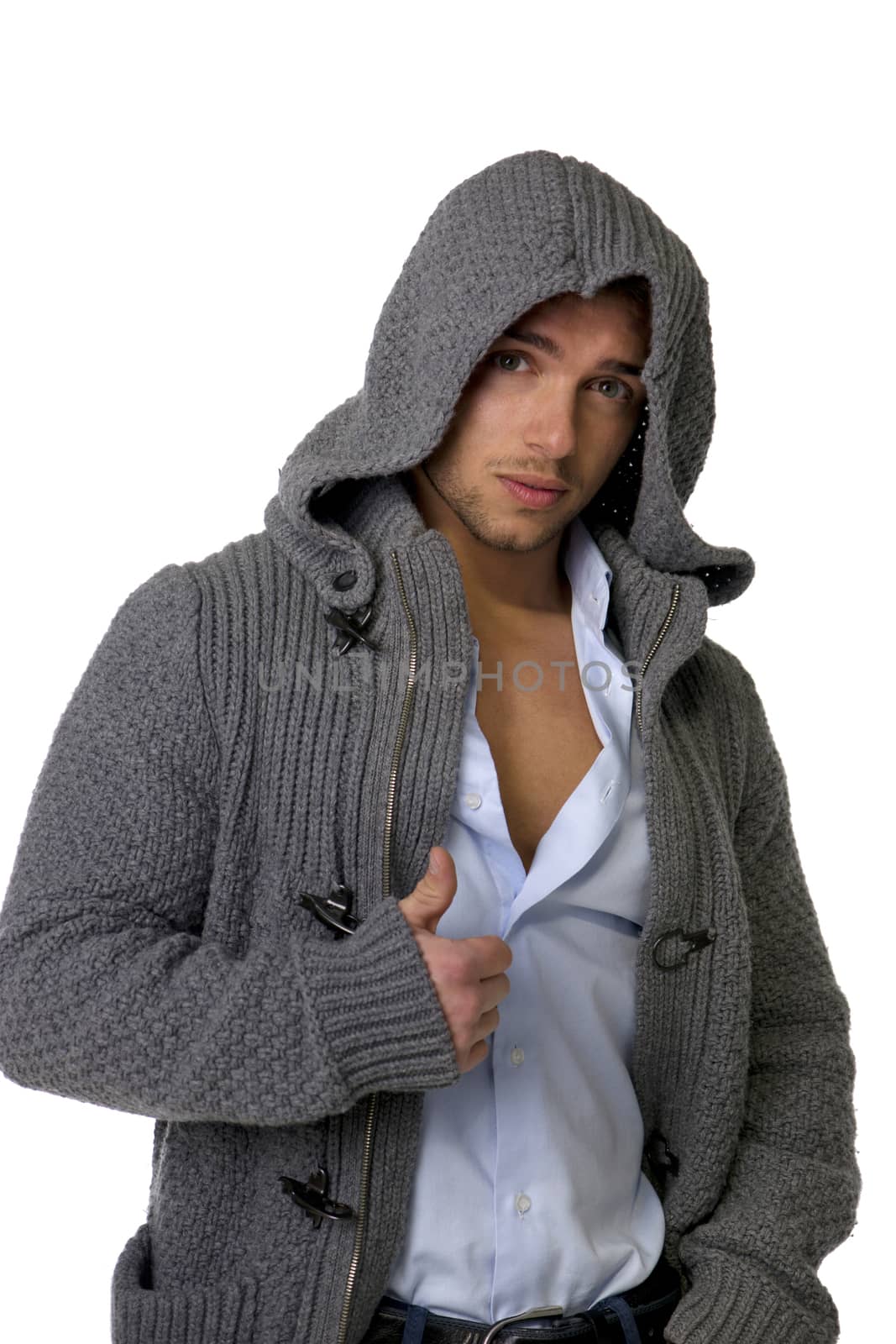 Good looking young man wearing winter hoodie sweater by artofphoto