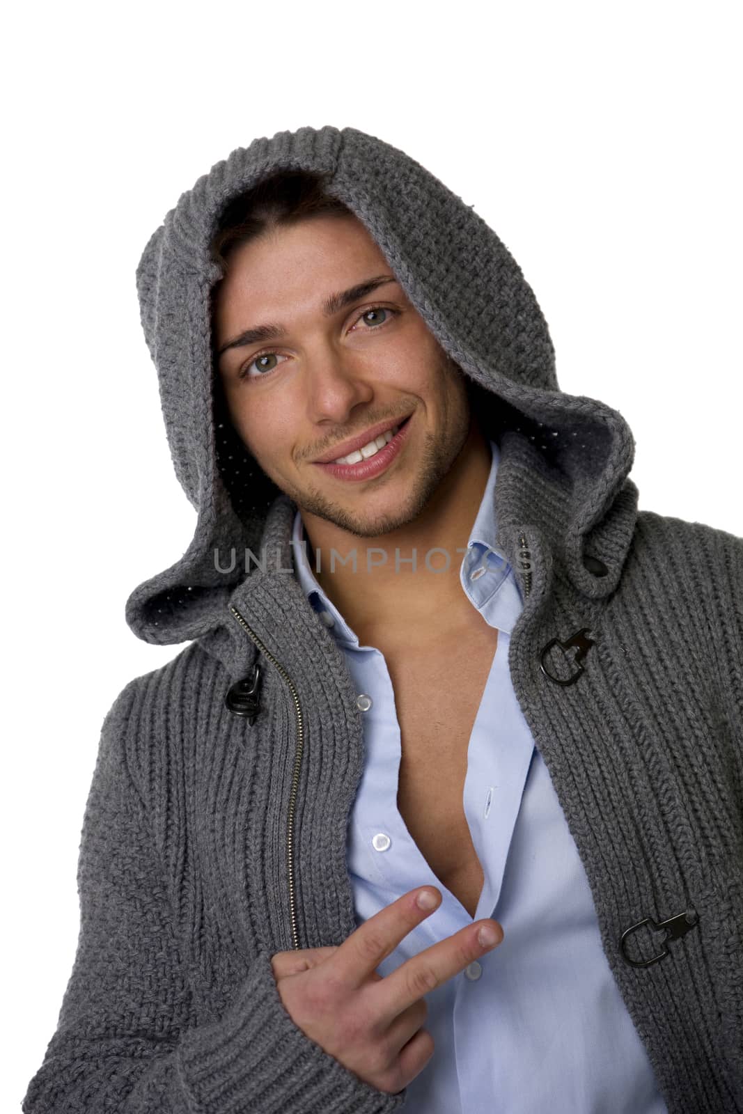 Good looking young man wearing winter hoodie sweater by artofphoto