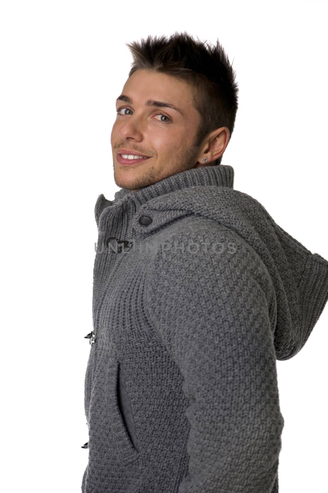 Good looking young man wearing winter hoodie sweater by artofphoto
