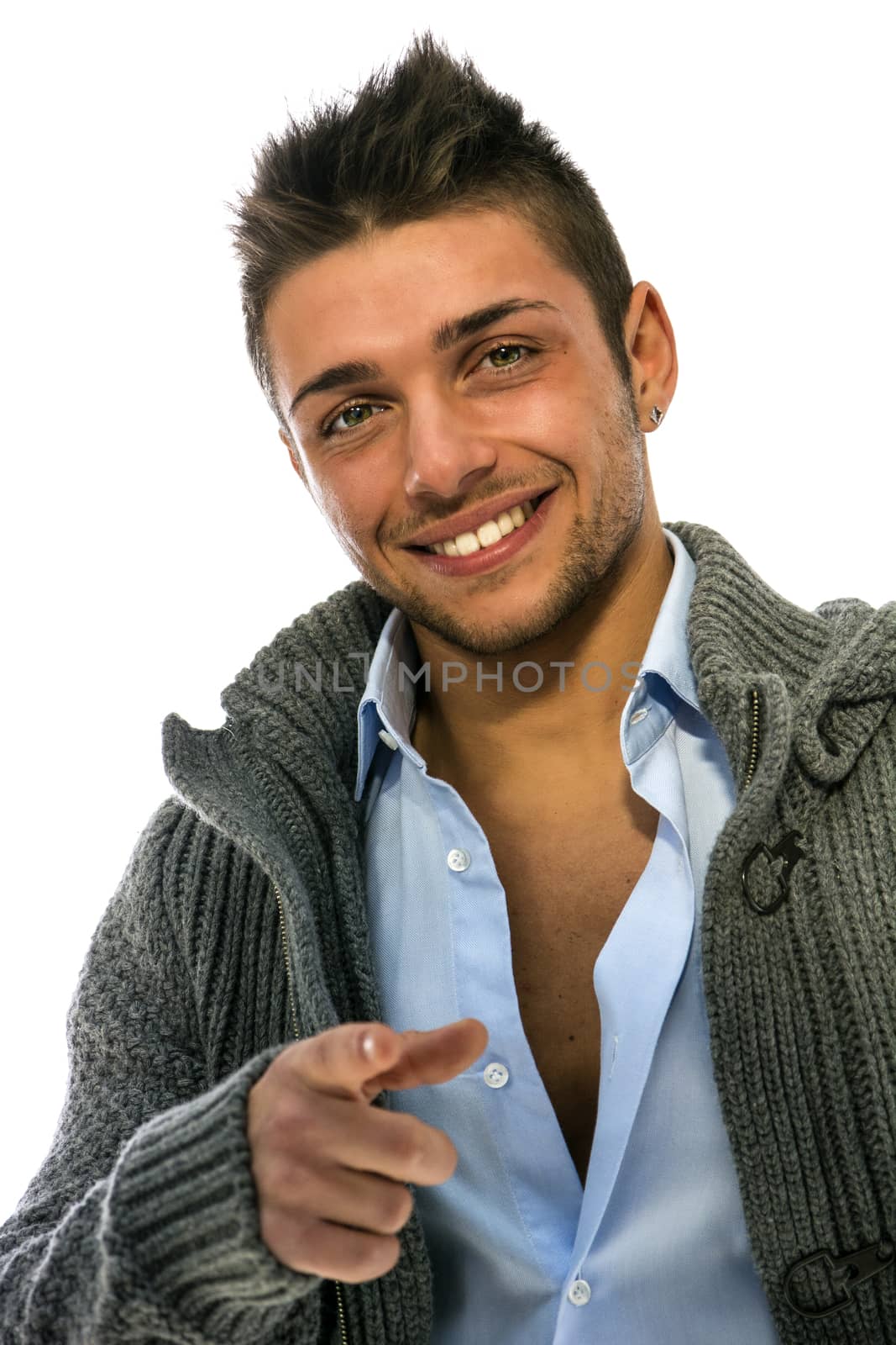 Good looking young man wearing winter hoodie sweater on shirt, smiling to camera