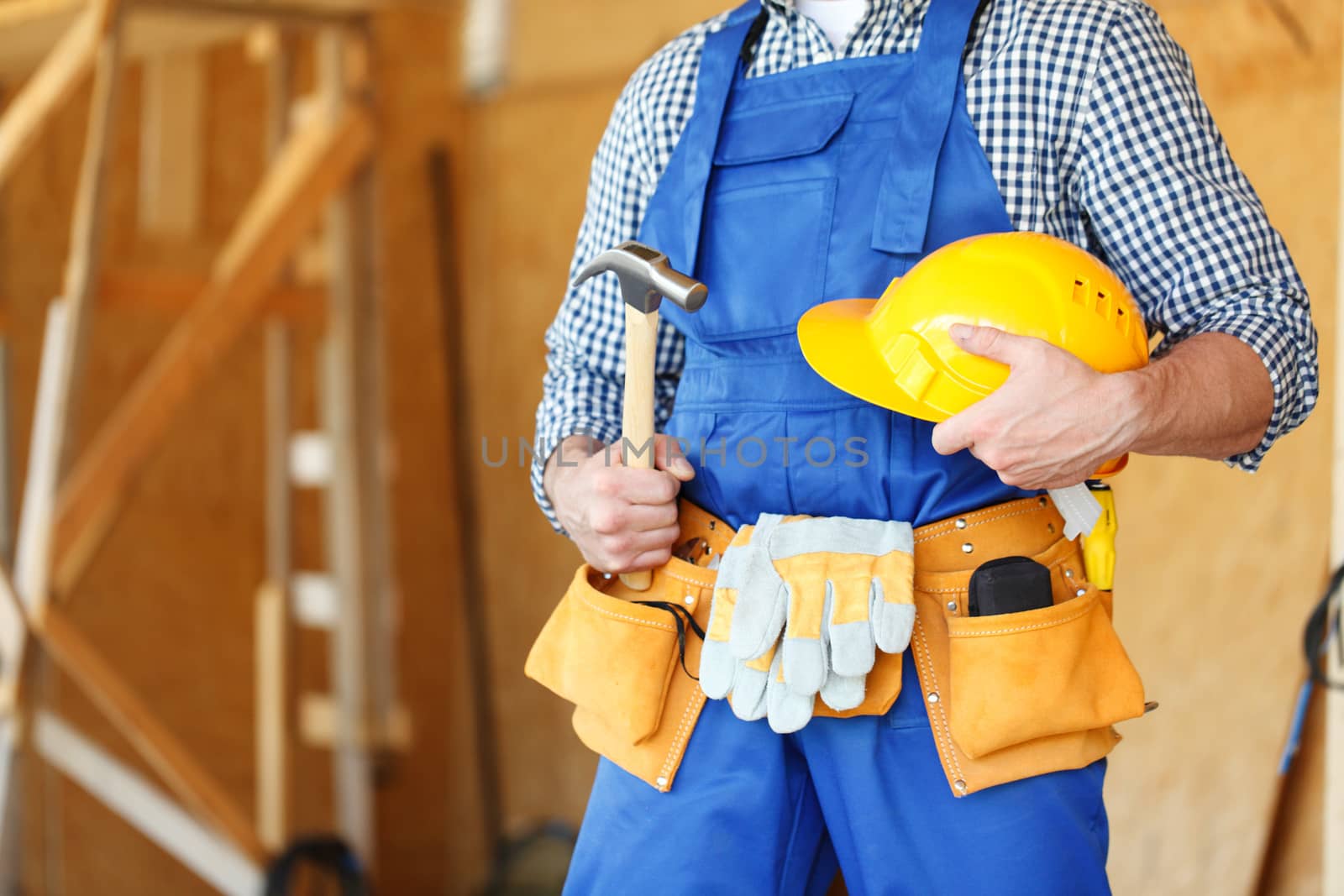 Construction worker with tools by ALotOfPeople