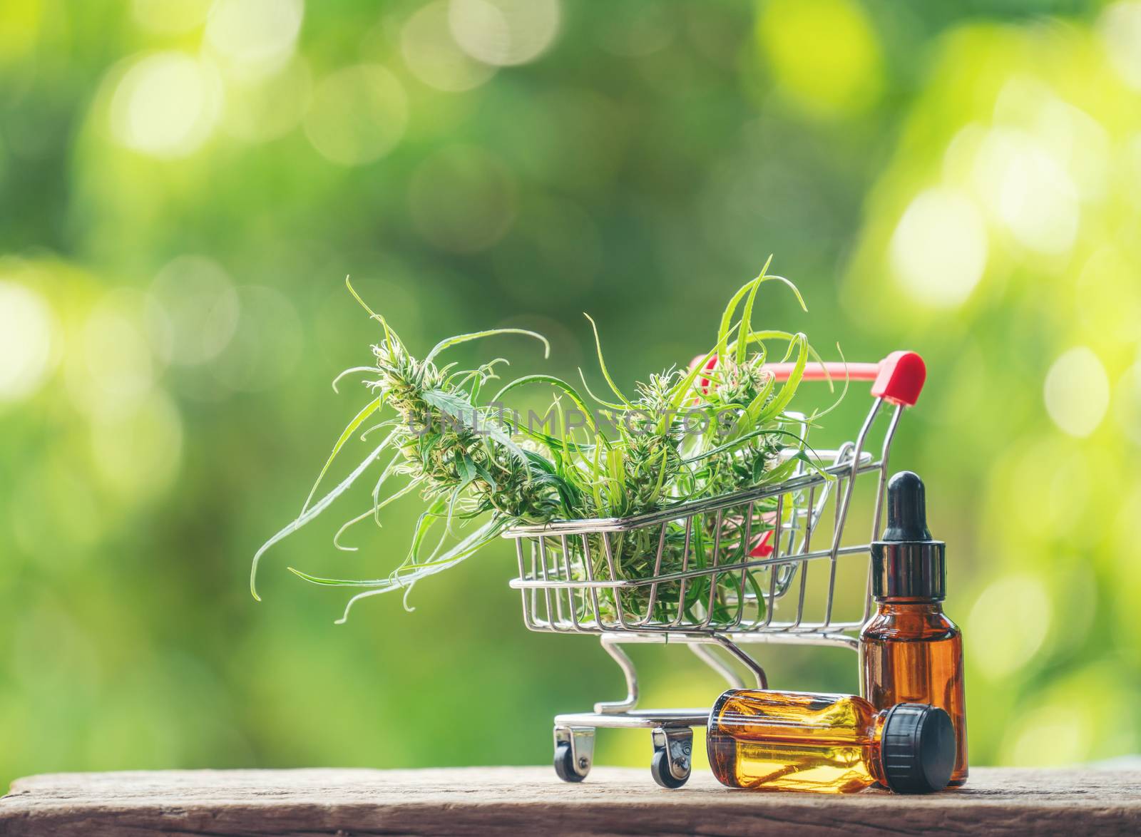 cannabidiol (cbd) extract in a shopping cart by anankkml