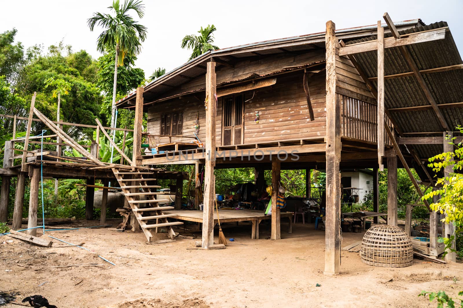 traditional houses of the native people of Thailand in village by peerapixs