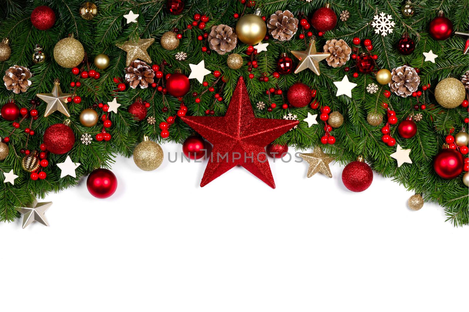 Christmas Border frame of tree branches on white background with copy space isolated, red and golden decor, berries, stars, cones