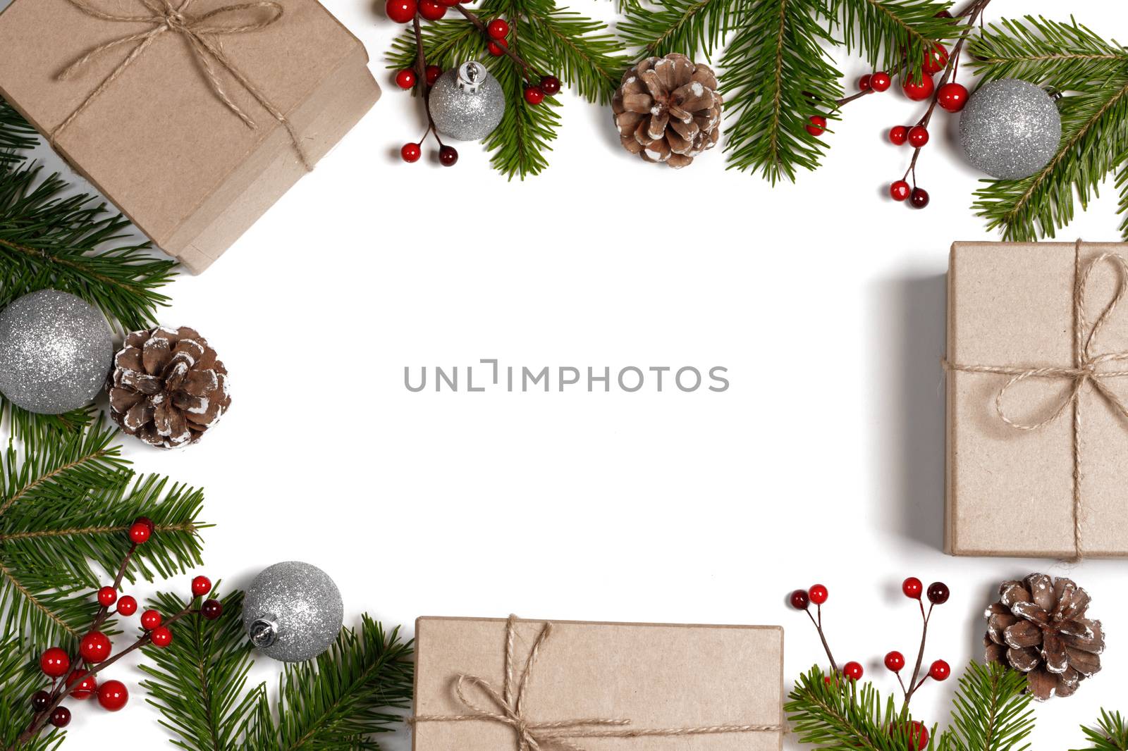 Christmas background with balls and decorations of holly berry, cones, gifts, balls on white