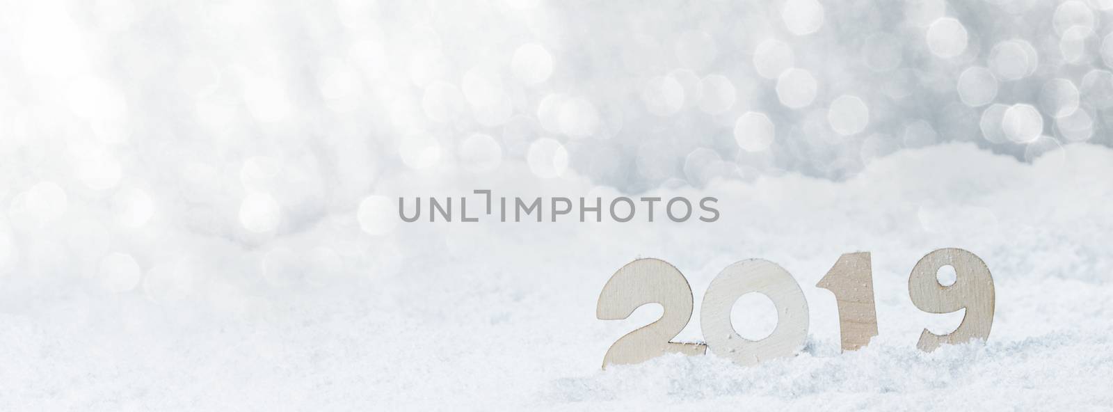 2020 New Year in snow design concept. Wooden 2020 New Year horizontal template with silver glitter backgound