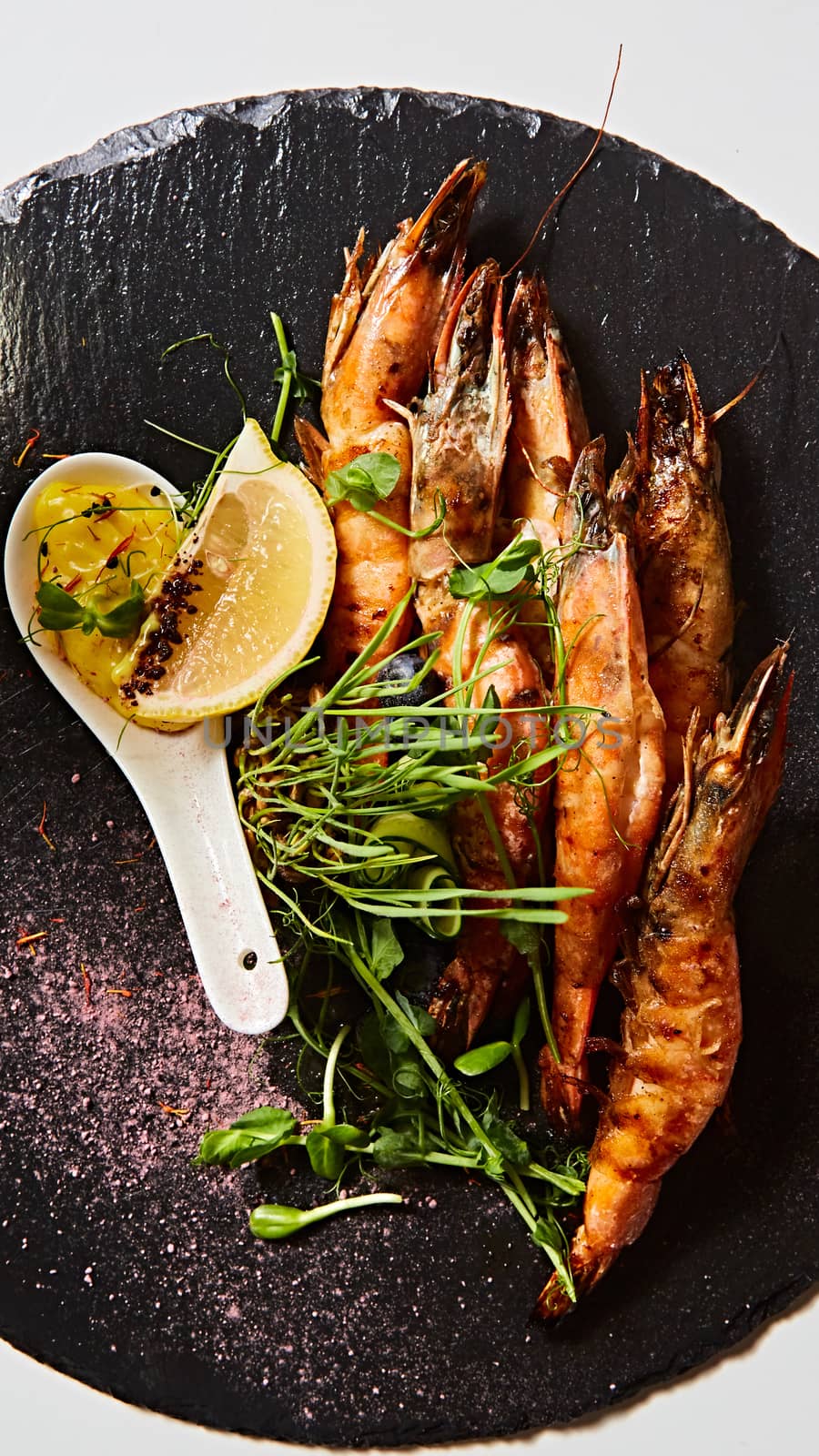 Grilled shrimp skewers. Seafood, shelfish. Shrimps Prawns skewers with herbs, garlic and lemon. by sarymsakov