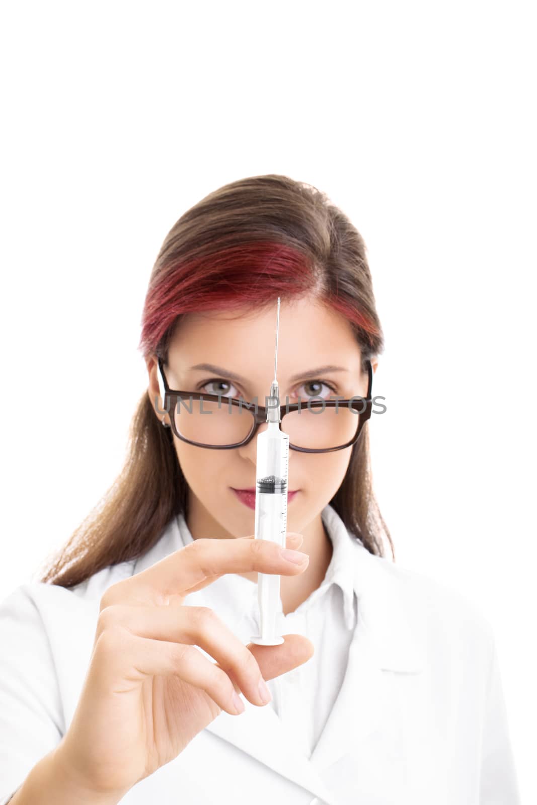Close up shot of a young female doctor with glasses holding a syringe with needle, isolated on white background.