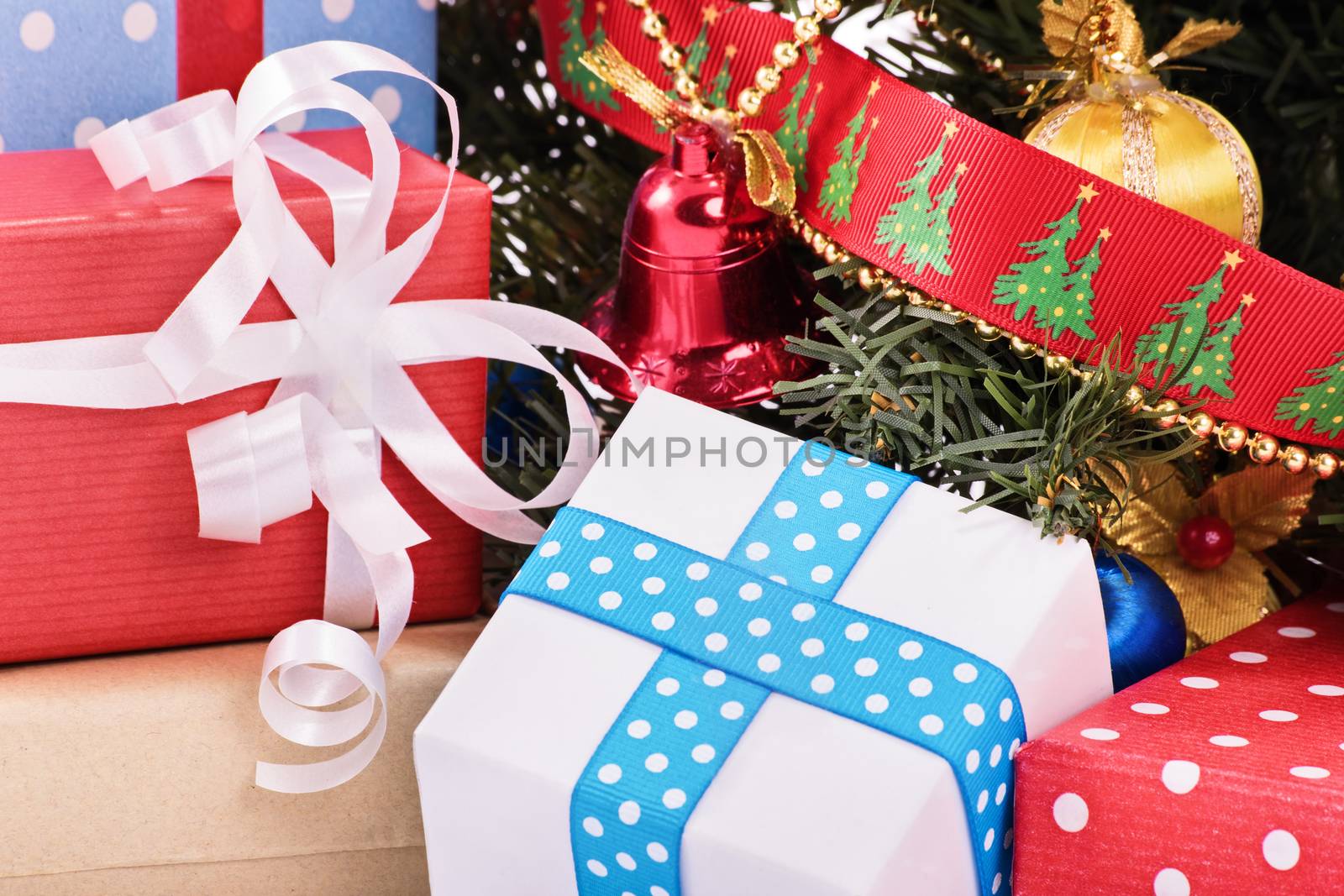 Close up shot of Christmas presents and ornaments by Mendelex