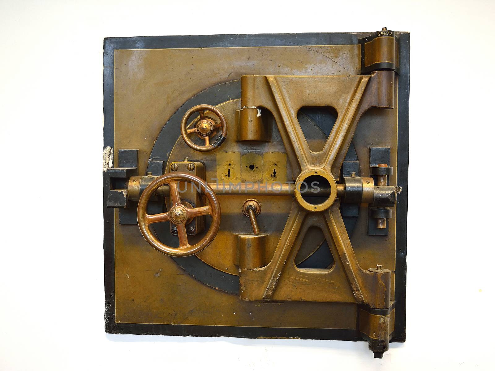 a heravy brass bank vault door