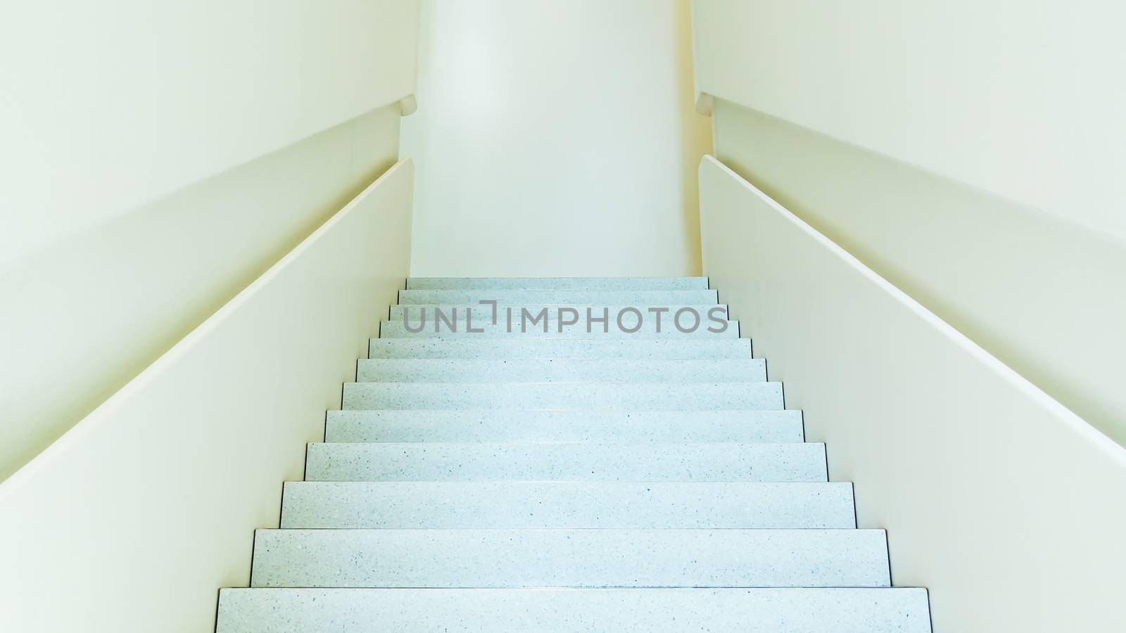 Staircase in light colors in a modern interior.