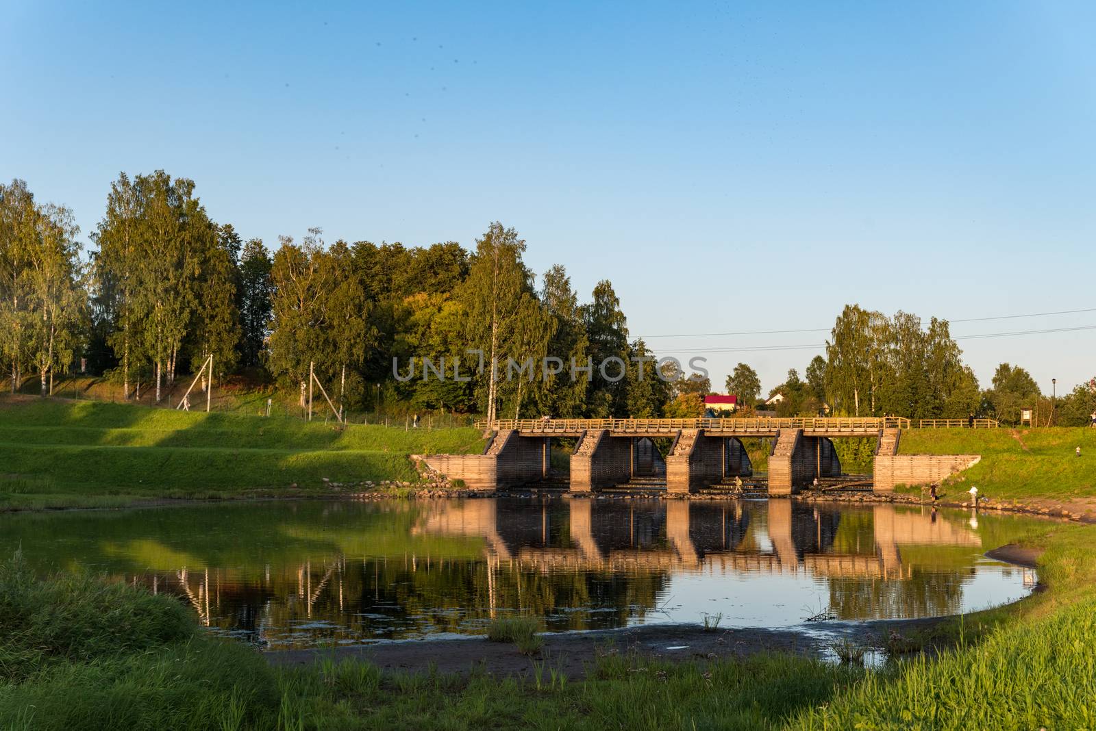 Newly restored elements of historical Tikhvin water system - wooden sluice. One of the landmark of Tikhvin, Russia