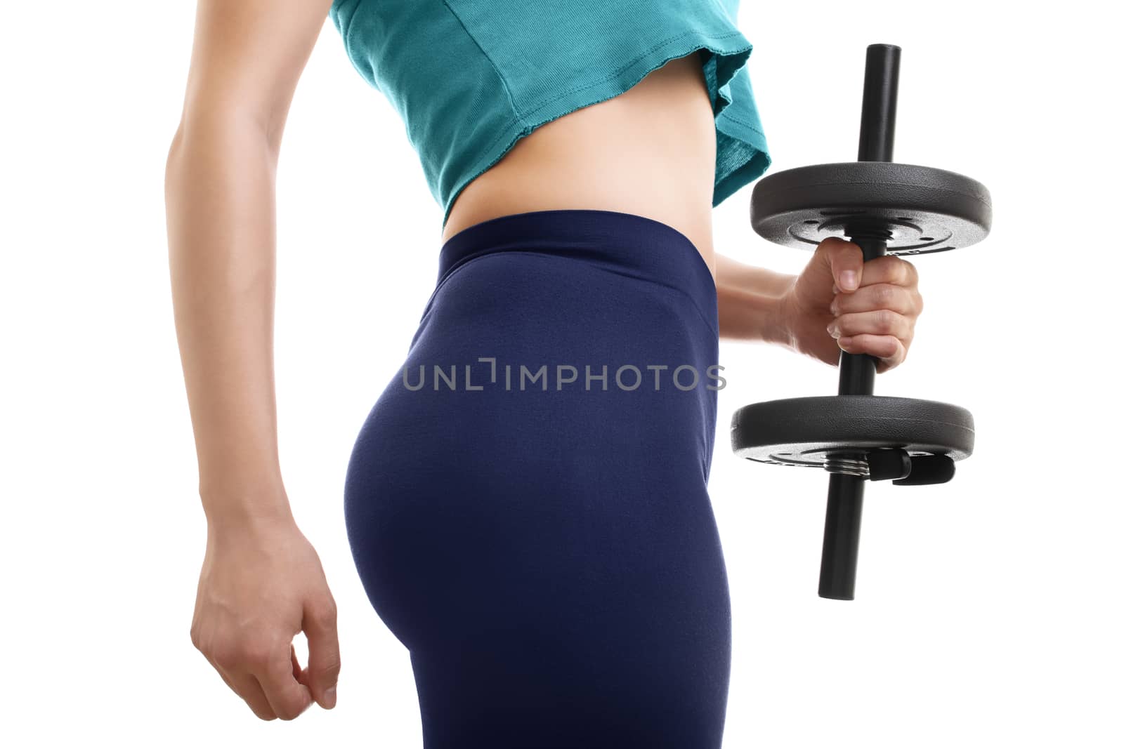 Close up shot of the waist section of a fit girl lifting a dumbbell, isolated on white background.