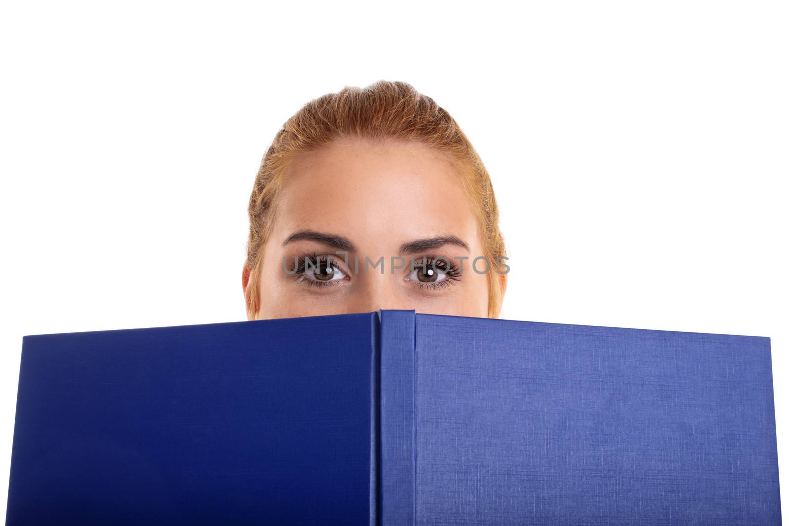 Young girl covering half of her face with a book by Mendelex