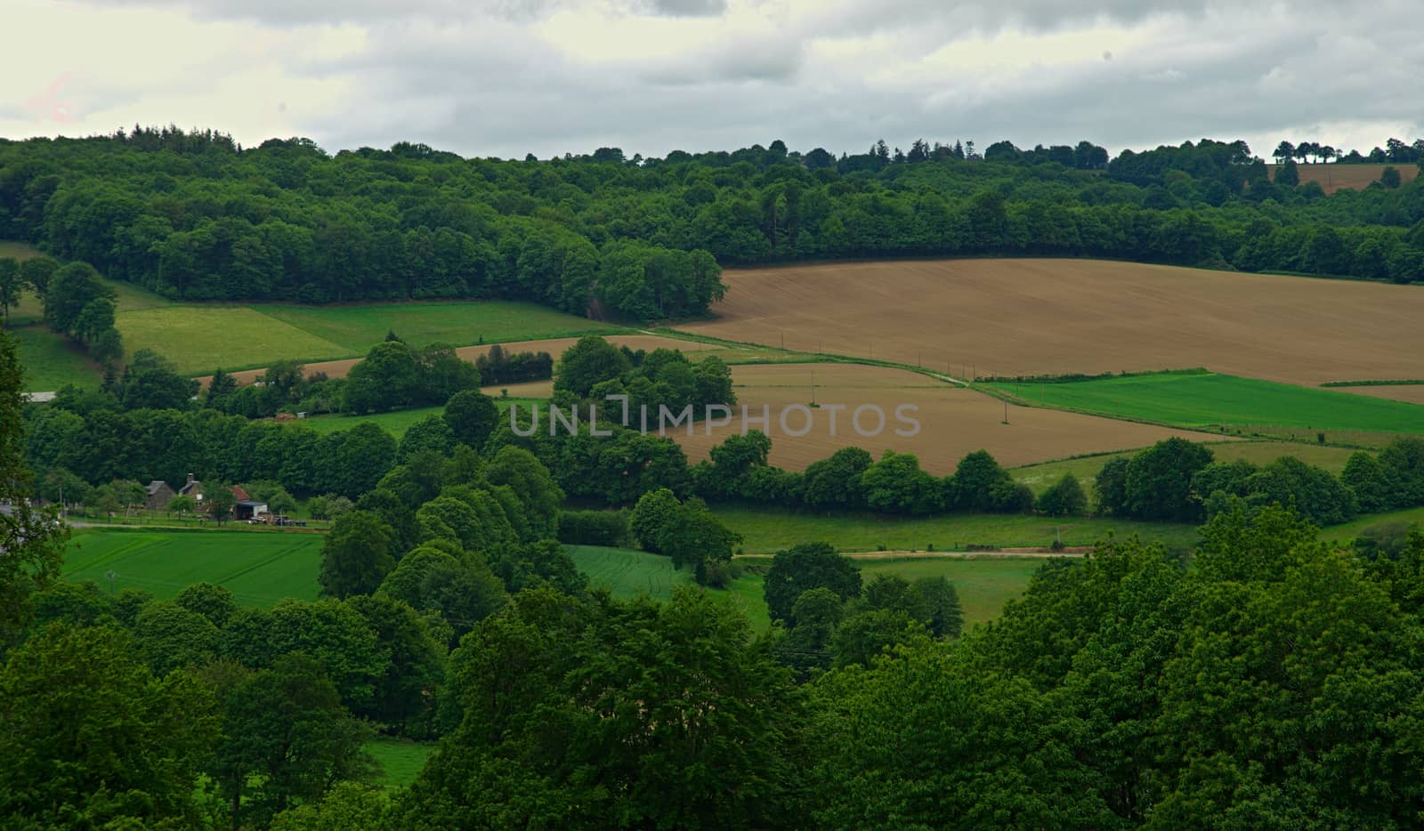 View from the hill on tranquil landscape in rural Normandy by sheriffkule