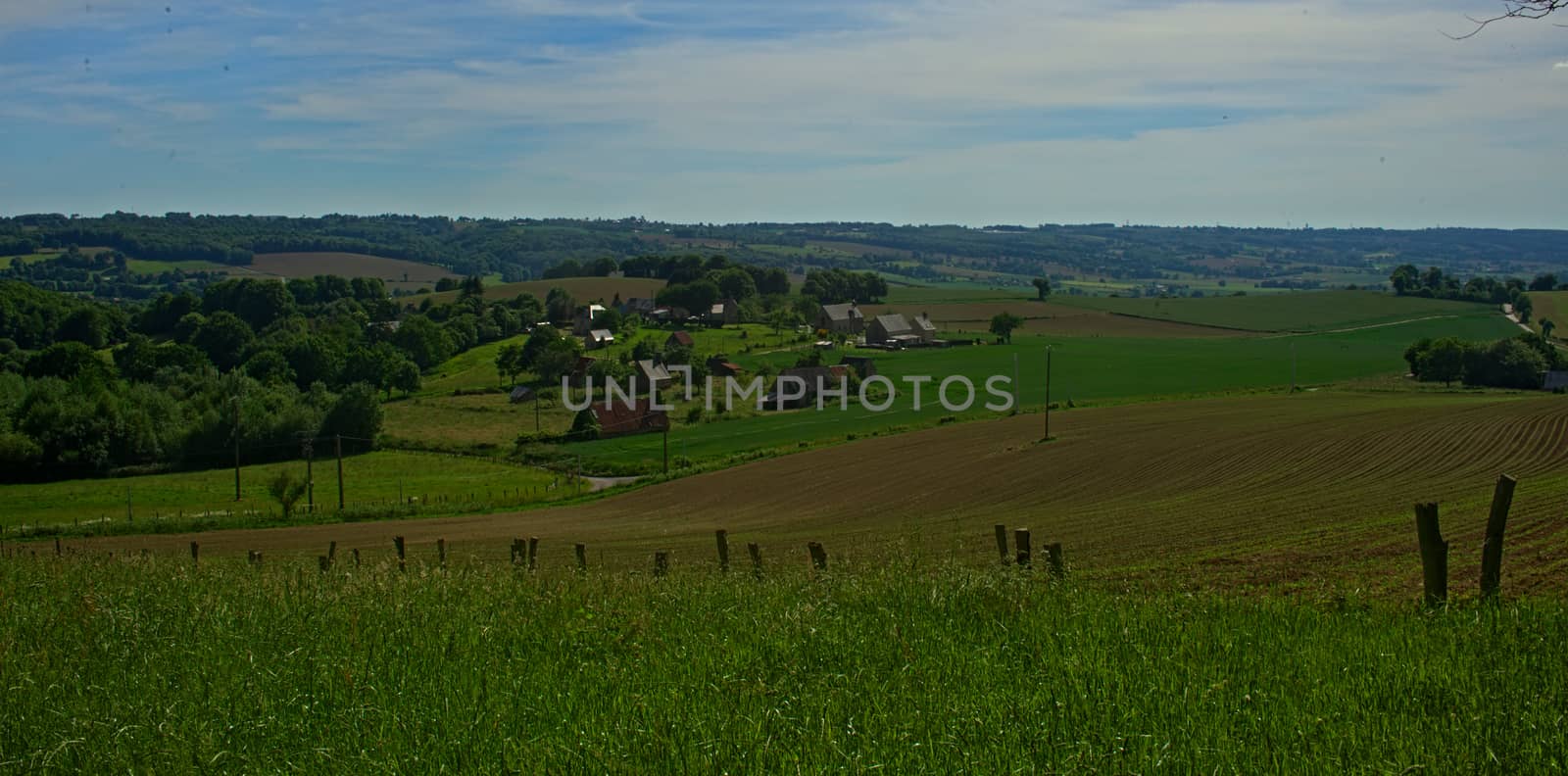 View from the hill on tranquil landscape in rural Normandy by sheriffkule