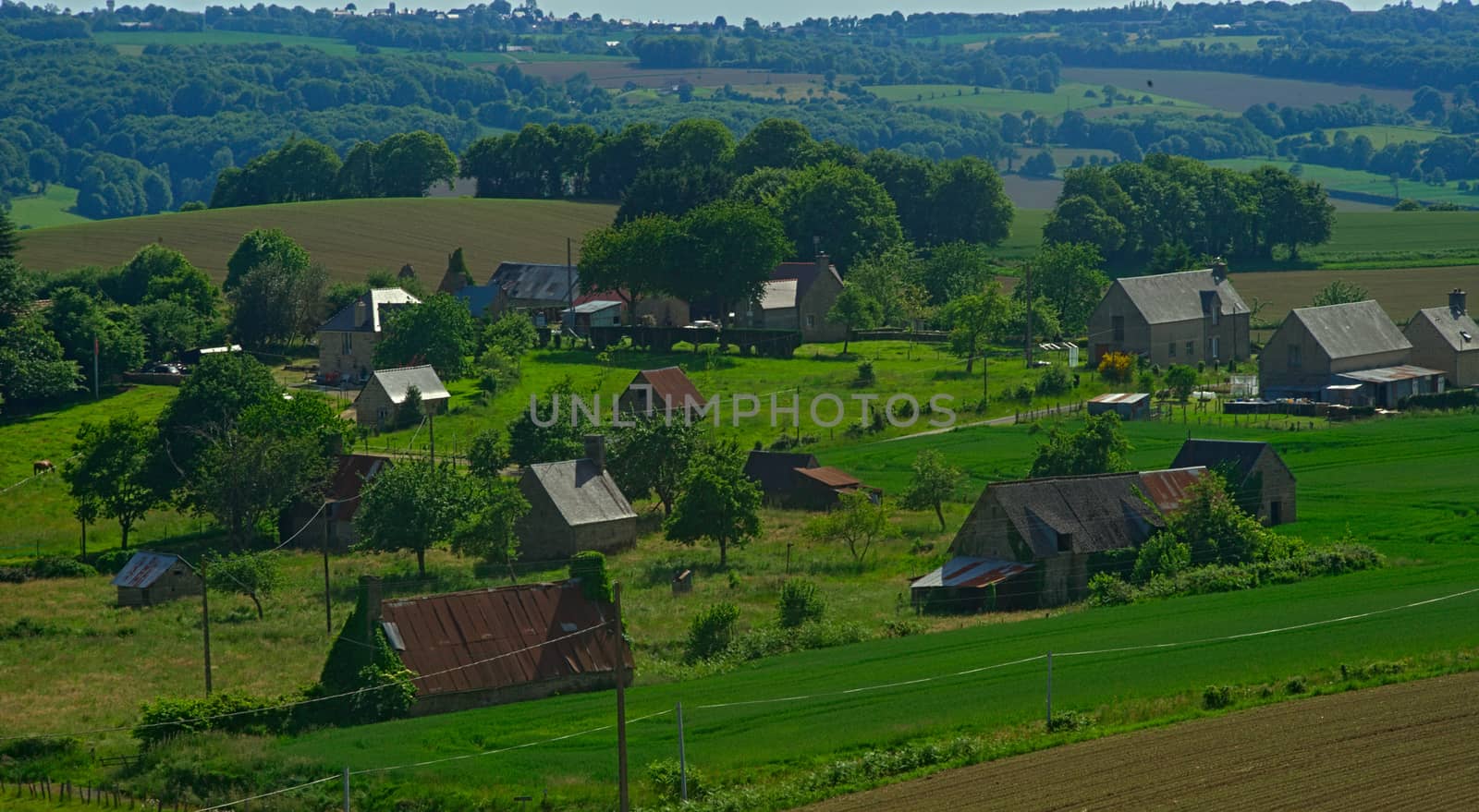 View from the hill on tranquil landscape in rural Normandy by sheriffkule