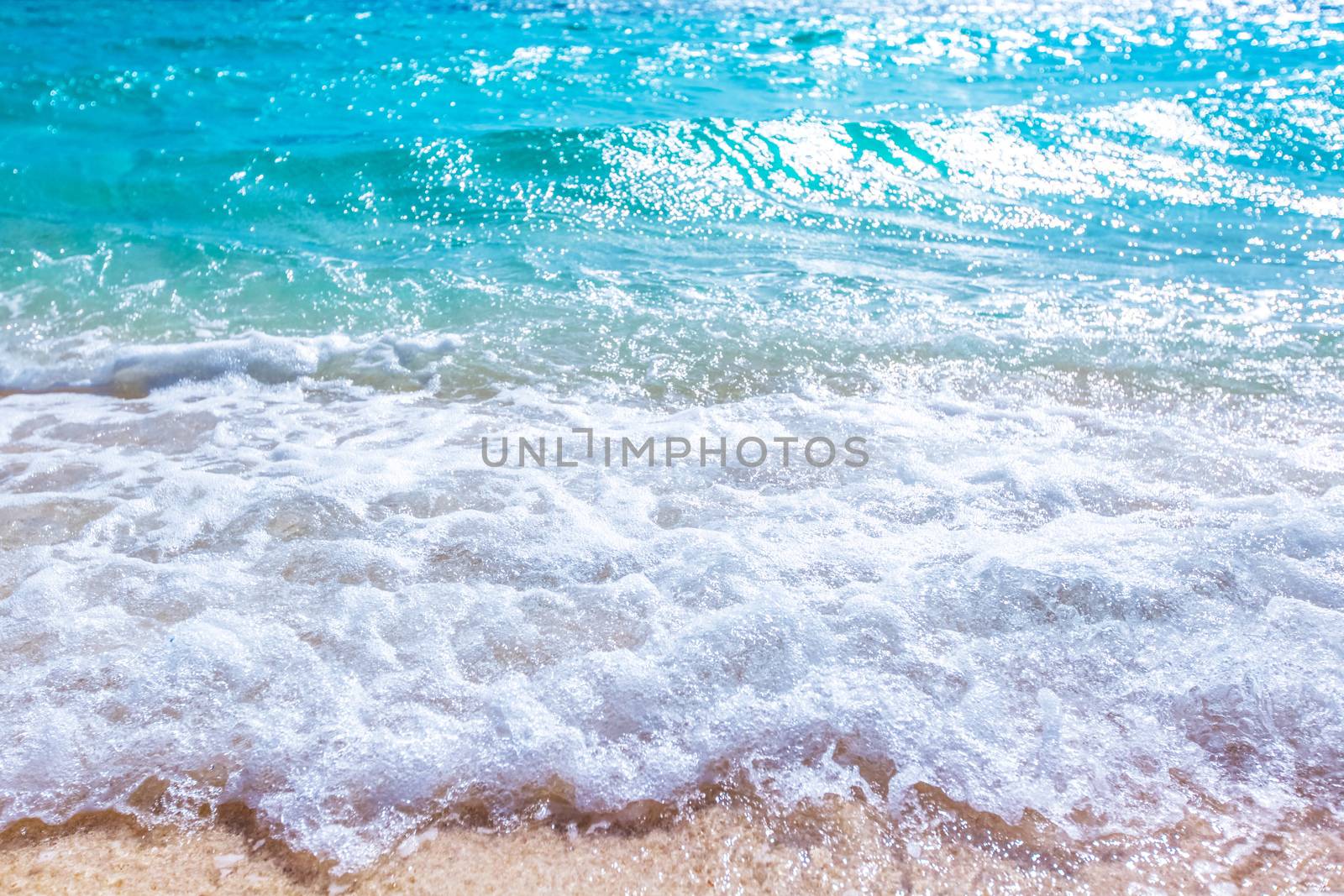 Wave of sea on sand beach beautiful natural background , seaside vacation concept