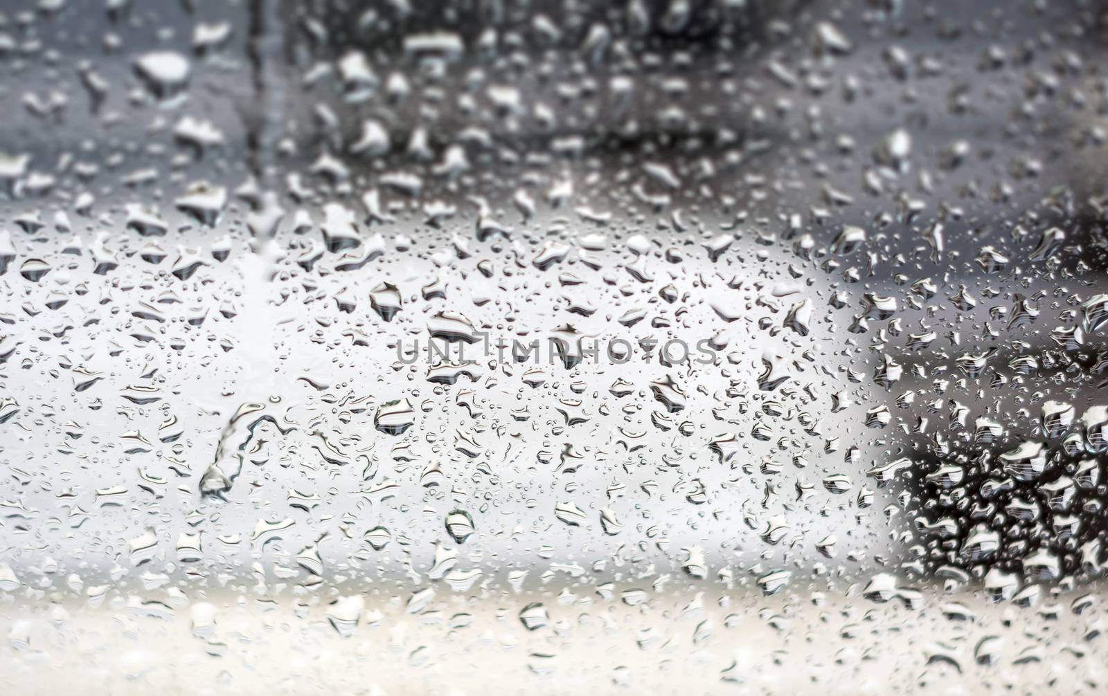 Raindrops on the window, abstract background. Seasonal concept