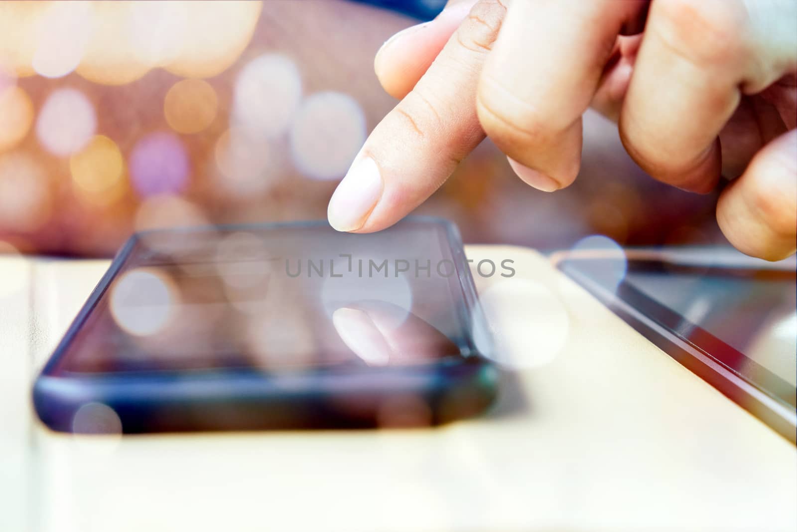 image of people using a smartphone.