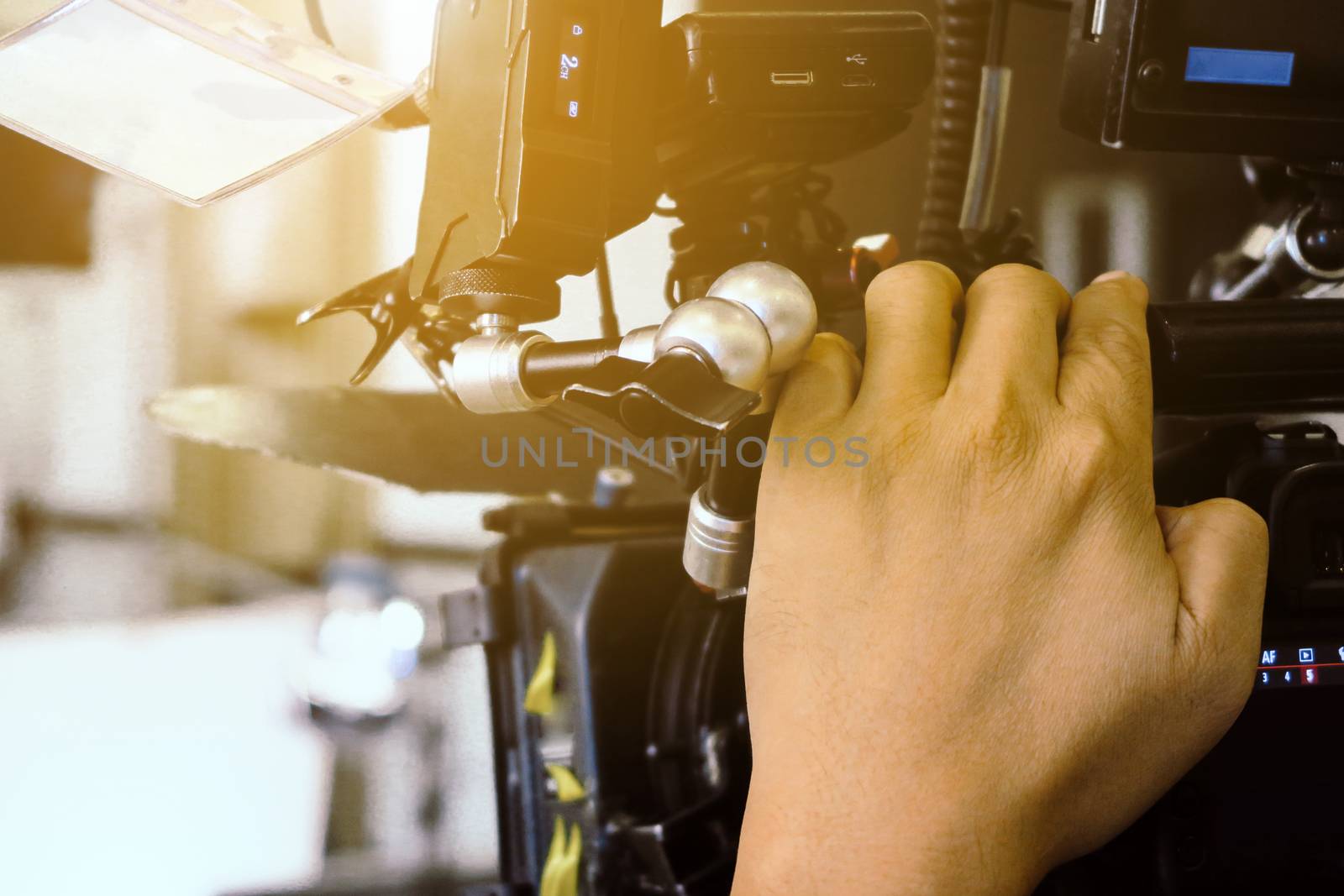 Film industry. Filming with professional camera background