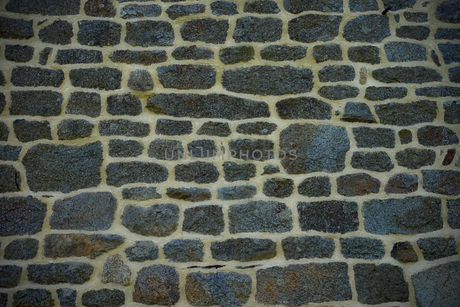 Retro stone wall on a house in France