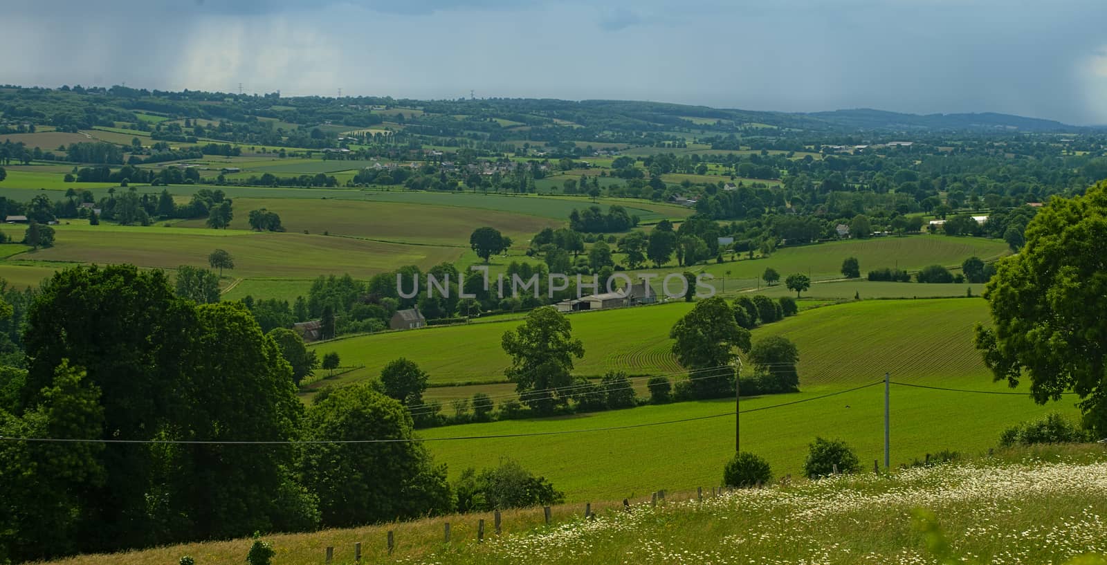 View from the hill on tranquil landscape in rural Normandy by sheriffkule