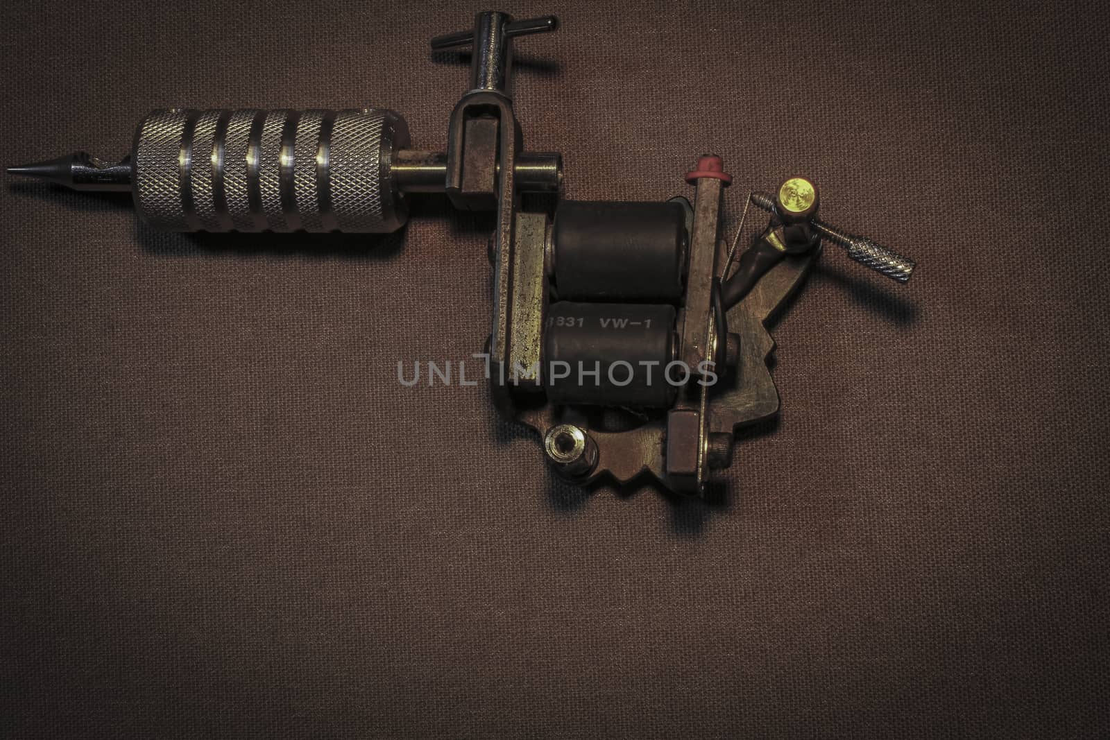 tattoo machine, with accessories and needles, tubes made in color background