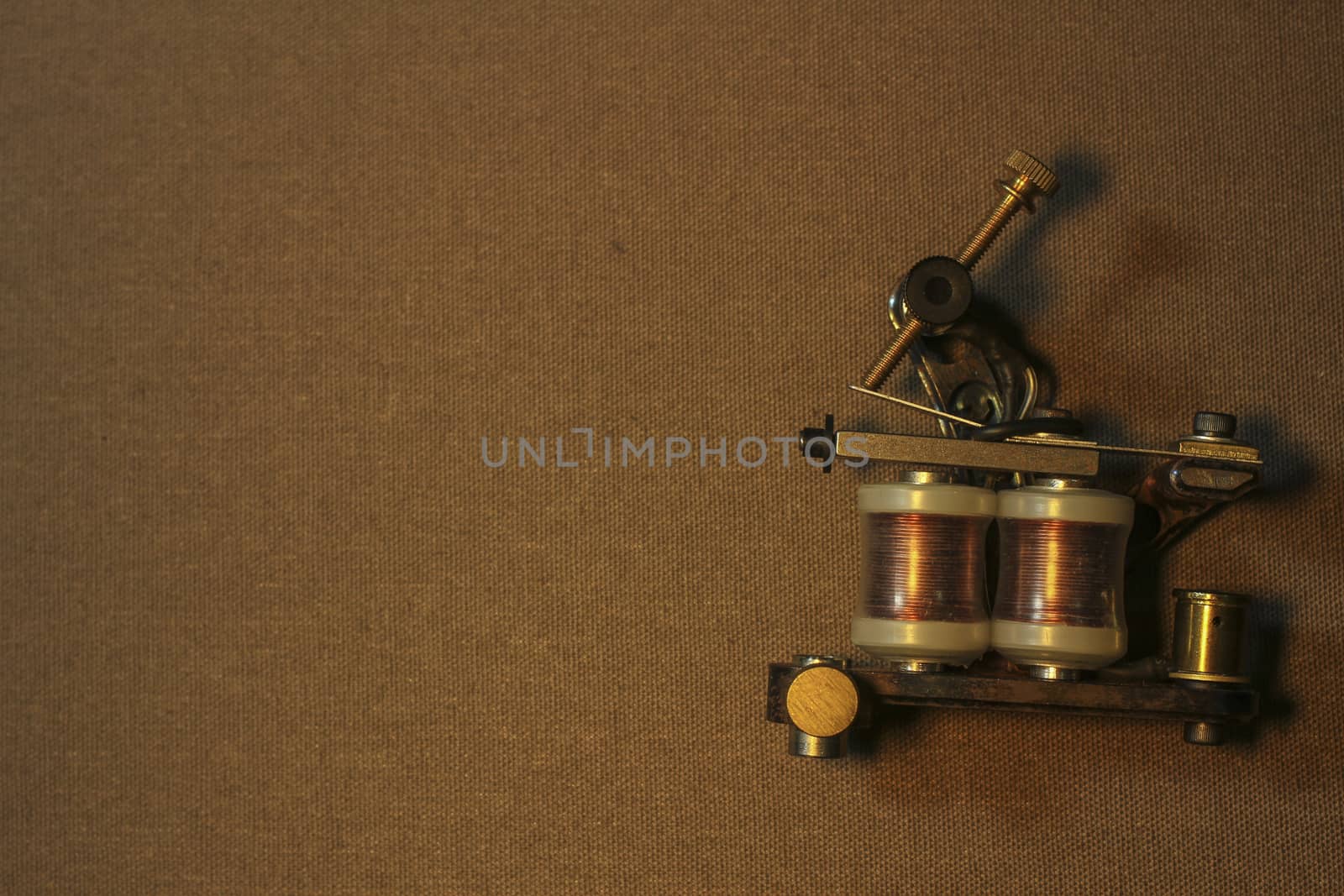 tattoo machine, with accessories and needles, tubes made in color background