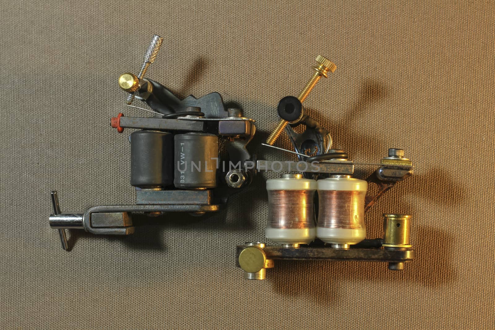 tattoo machine, with accessories and needles, tubes made in color background