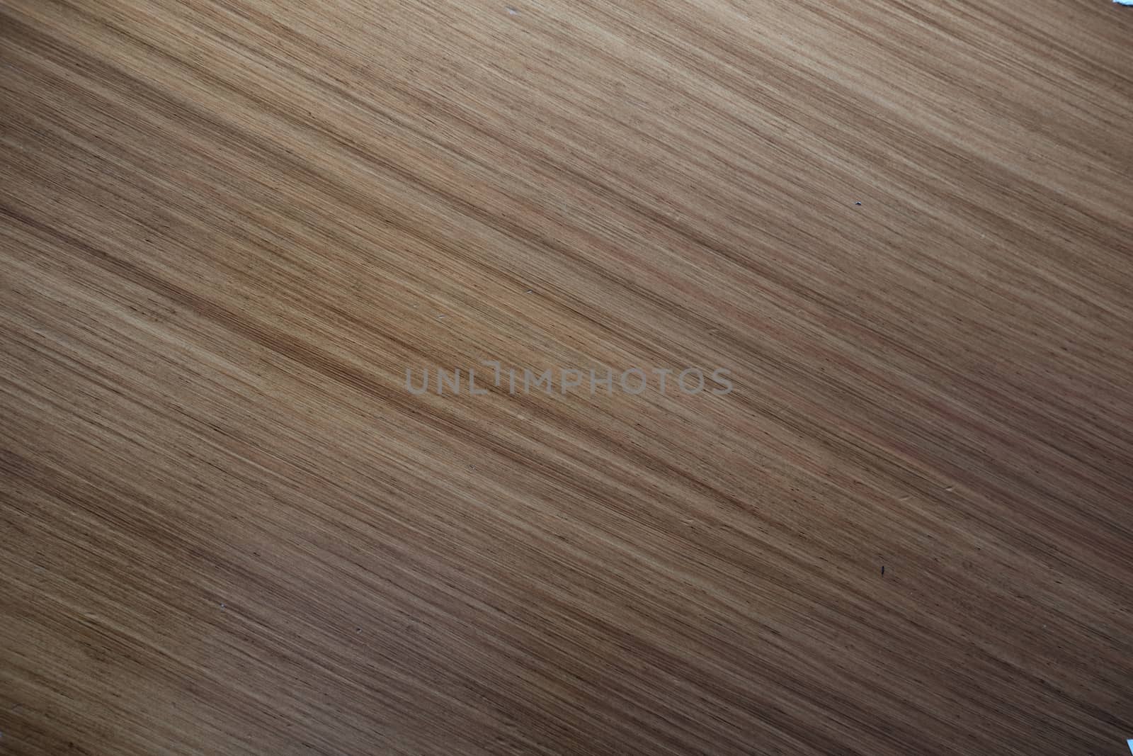 Light and dark streaks cross this wooden table making a beautiful natural background