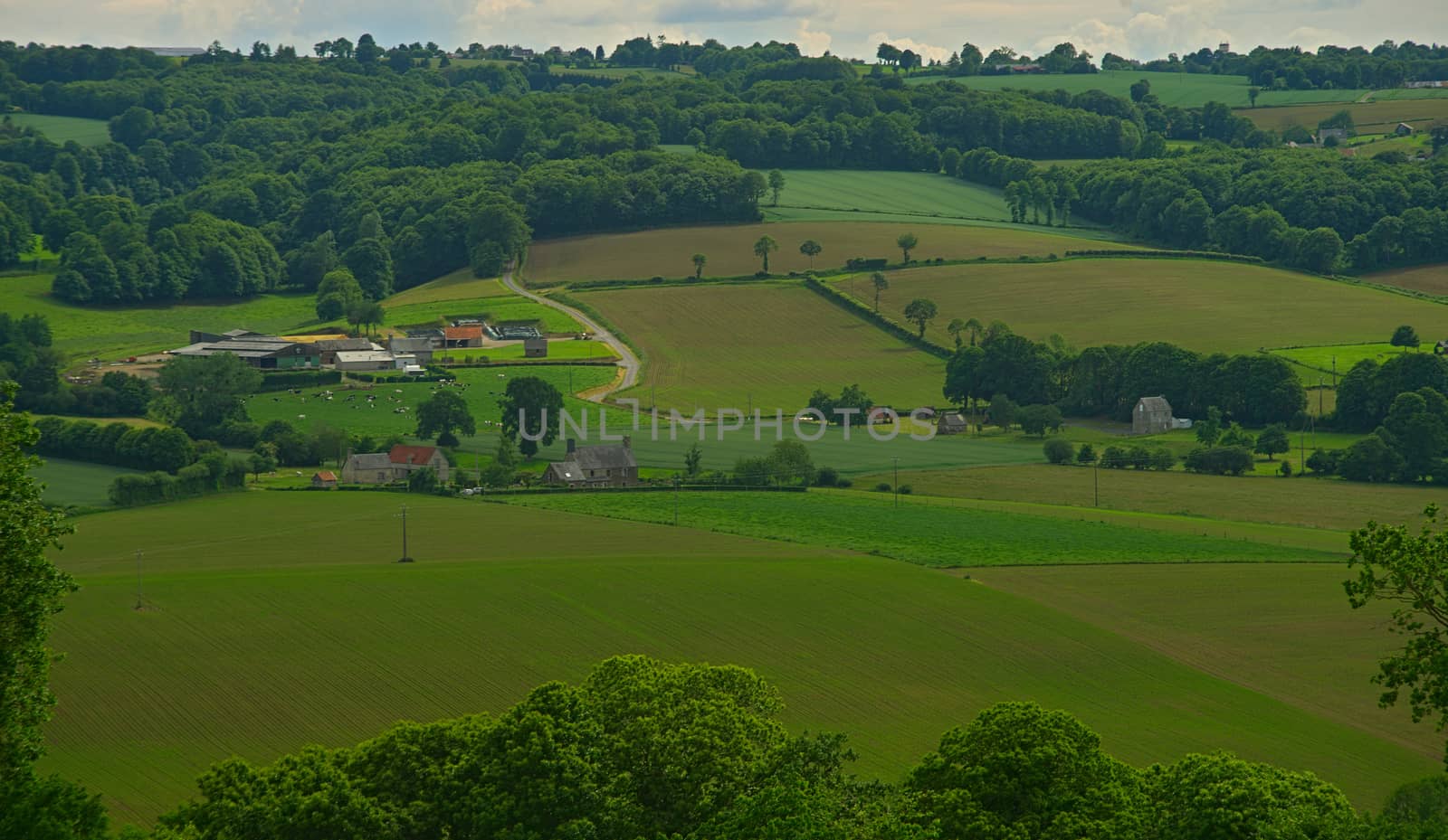 View from the hill on tranquil landscape in rural Normandy by sheriffkule