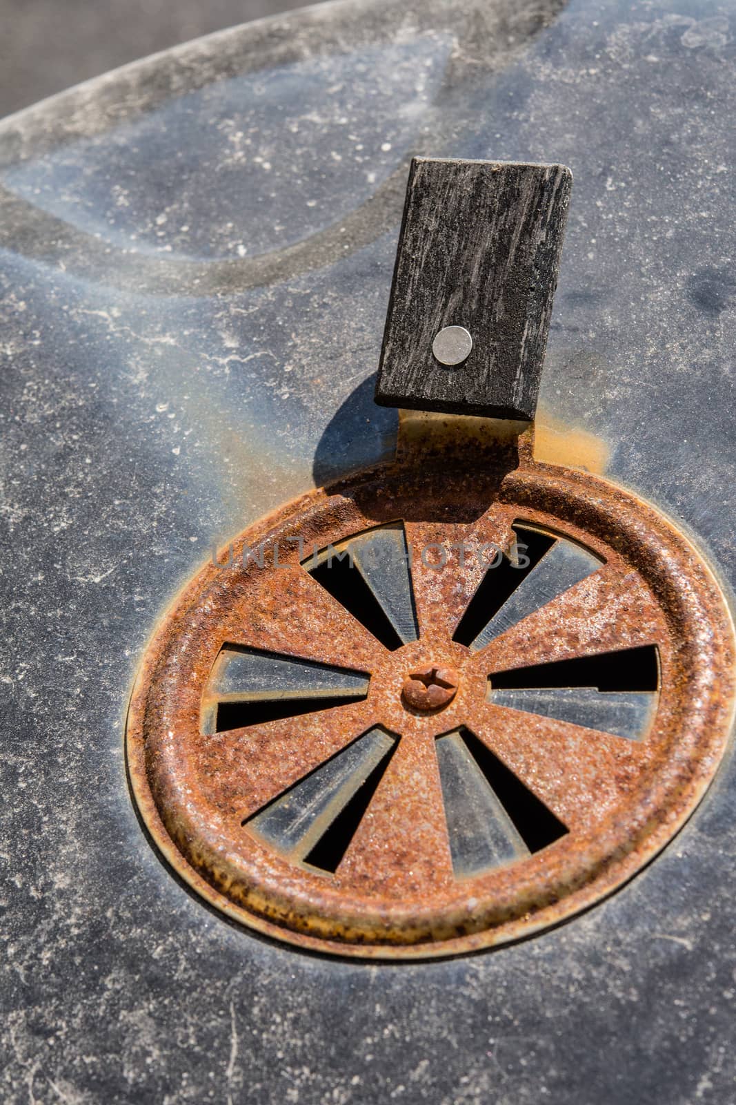 Rust on metal barbecue vent by ben44