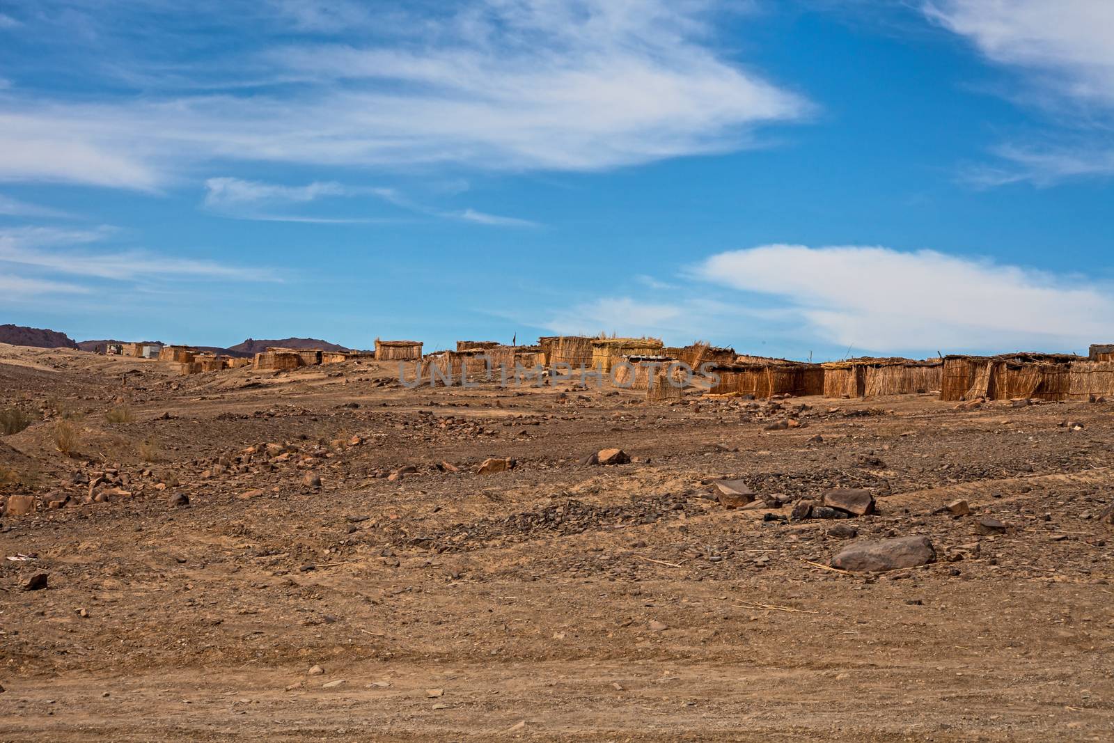 The houses are constructed with reeds from the banks of the Orange River in an attempt to escape the extreme desert climate of southern Namibia.