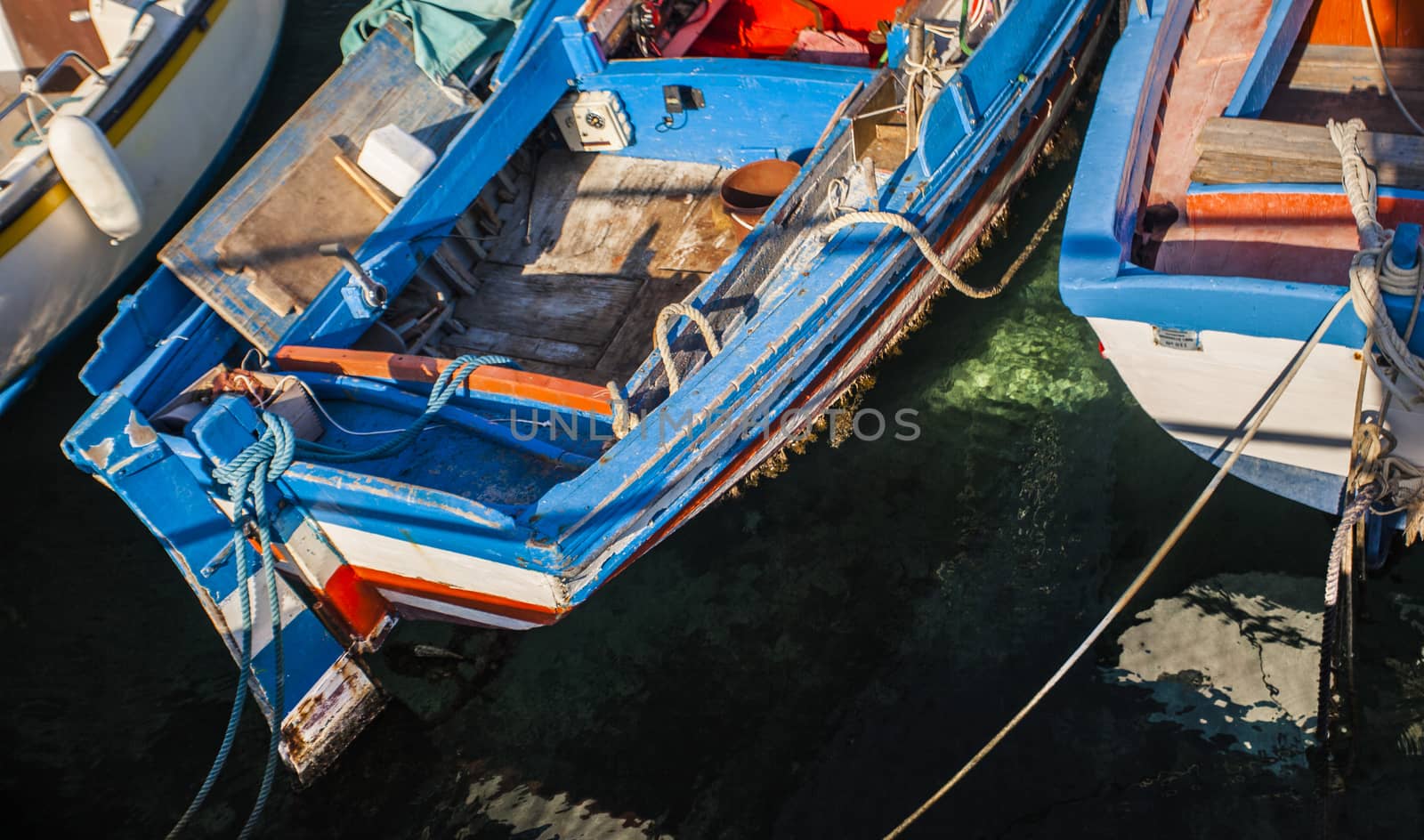 Detail of an old coloured wooden boat