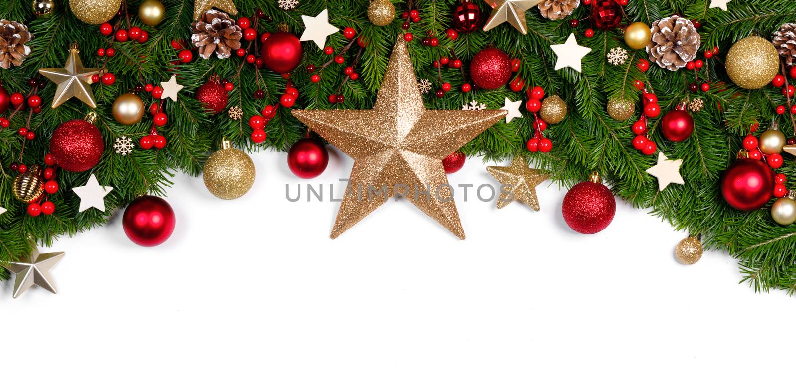 Christmas Border frame of tree branches on white background with copy space isolated, red and golden decor, berries, stars, cones