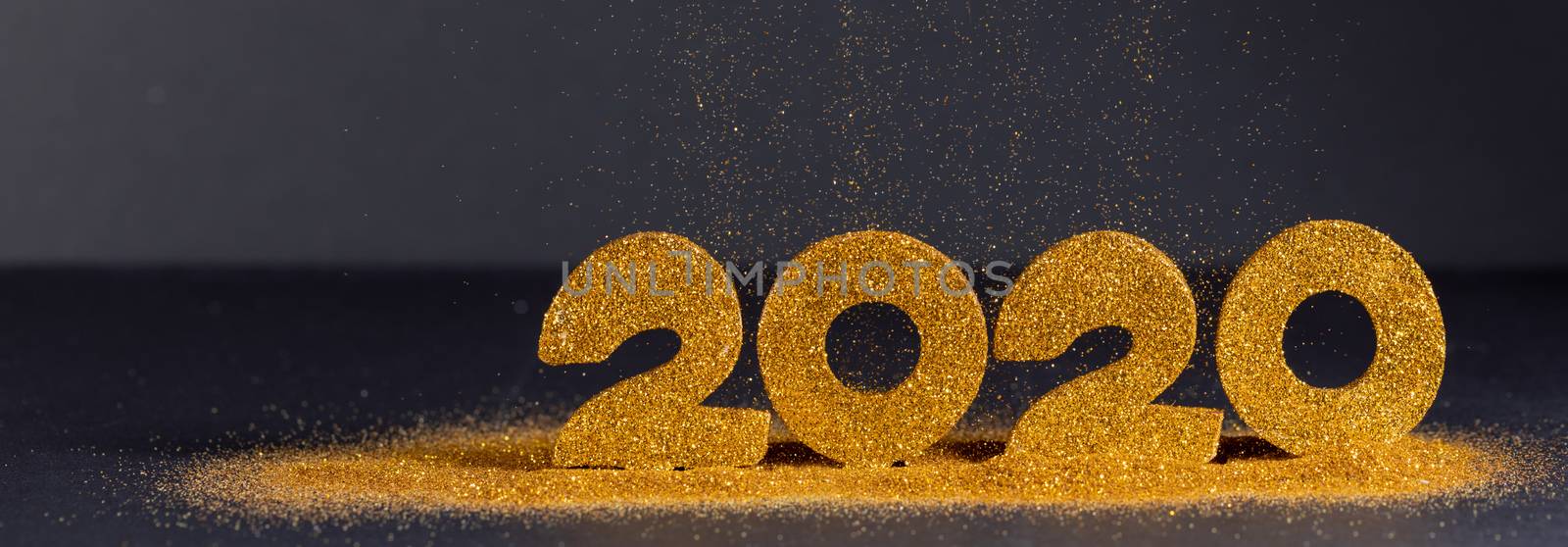 2020 New Year luxury design concept. Golden 2020 New Year horizontal template with golden glitter on blue backgound