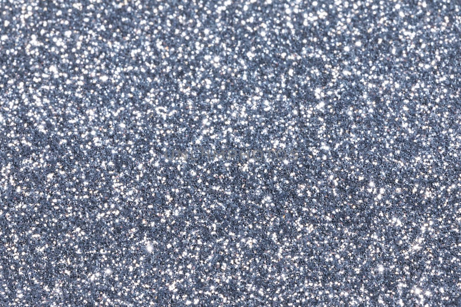 Shiny silver bokeh glitter lights abstract background, Christmas New Year party celebration concept