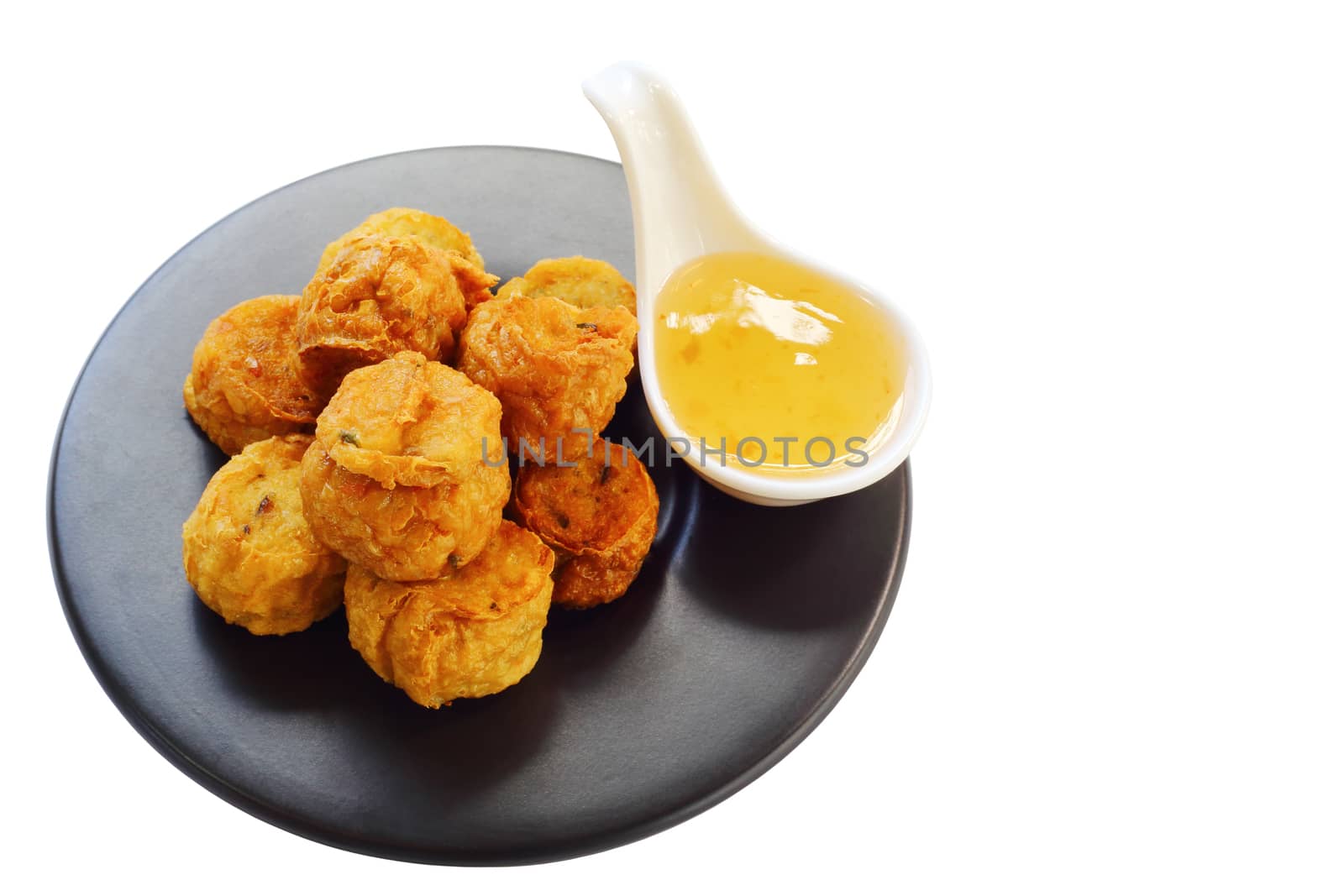Deep fried crab meat rolls (Hoi Jo) with sweet sauce isolated over white background - Chinese food style, clipping path.