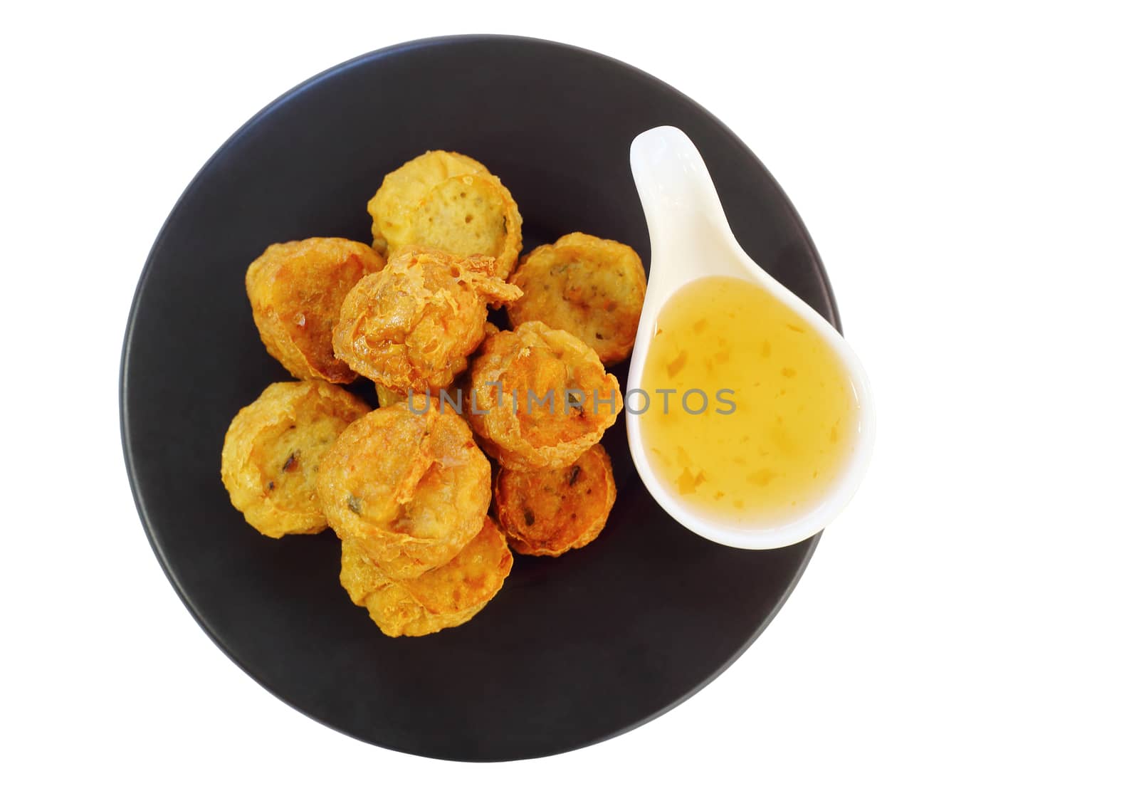 Deep fried crab meat rolls (Hoi Jo) with sweet sauce isolated over white background - Chinese food style, clipping path.