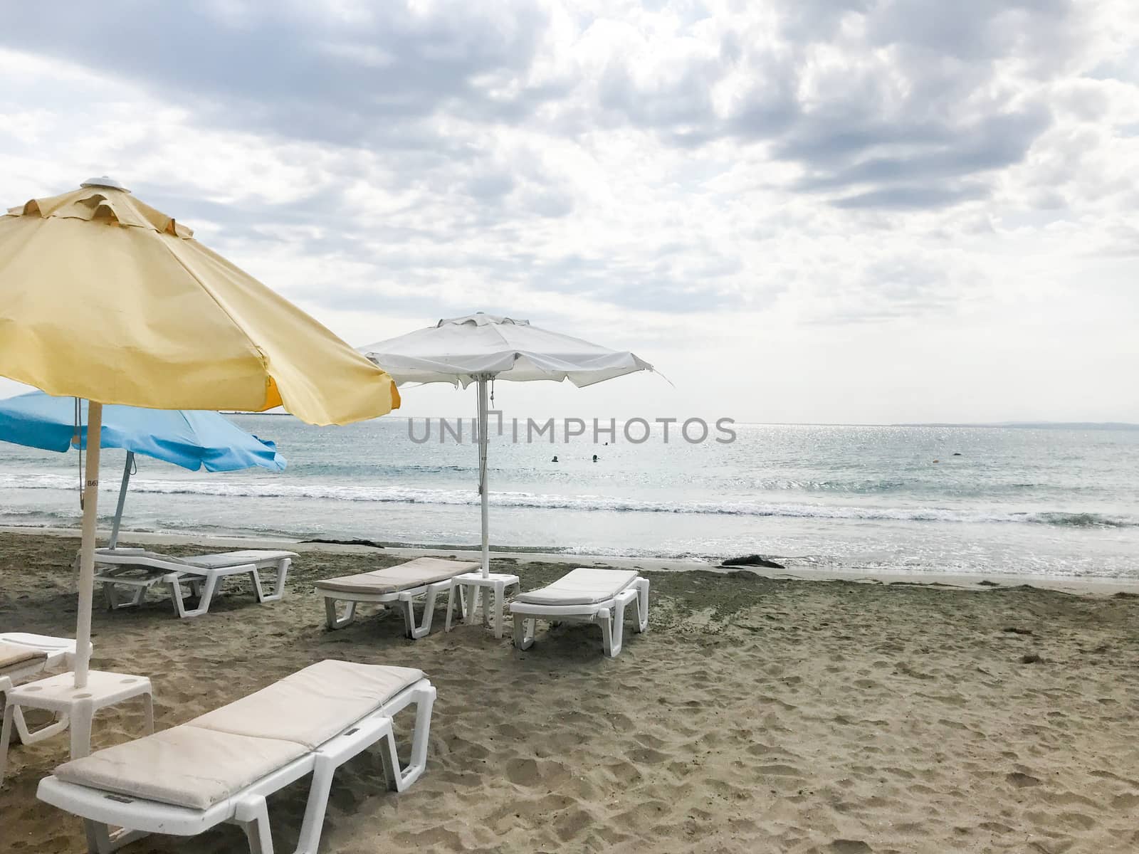 Pomorie, Bulgaria - September 12, 2019: People Relaxing On The Beach. by nenovbrothers