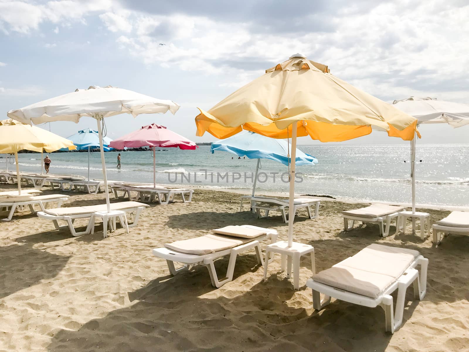 Pomorie, Bulgaria - September 12, 2019: People Relaxing On The Beach.