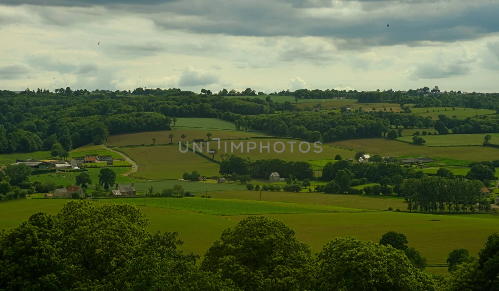 View from the hill on tranquil landscape in rural Normandy by sheriffkule