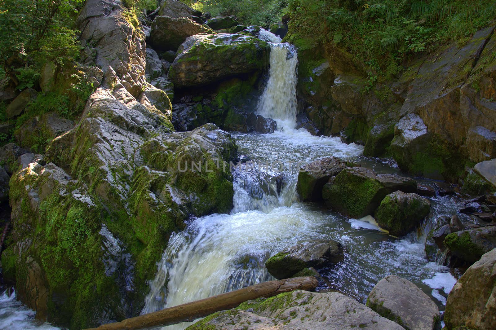 Cascade of waterfalls on a small mountain river. The third river, Altai, Russia.