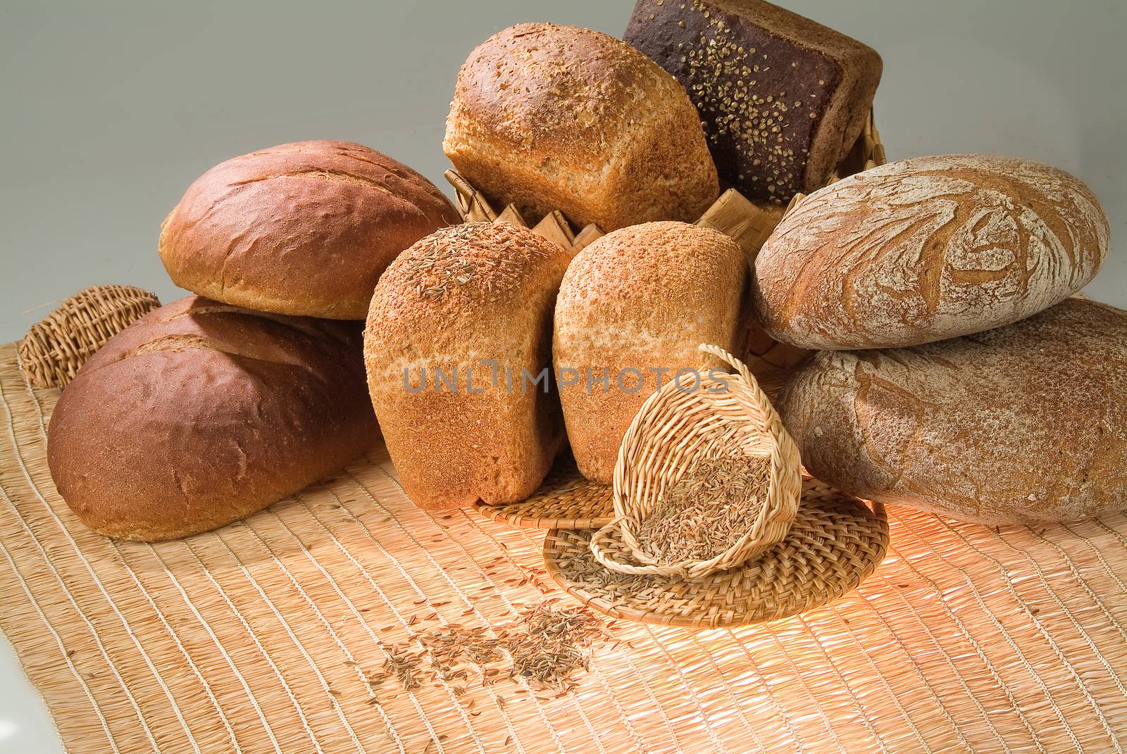 Different kinds of bread on a studio background