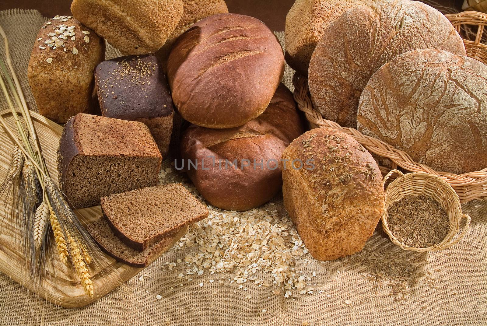 Different kinds of bread on a studio background