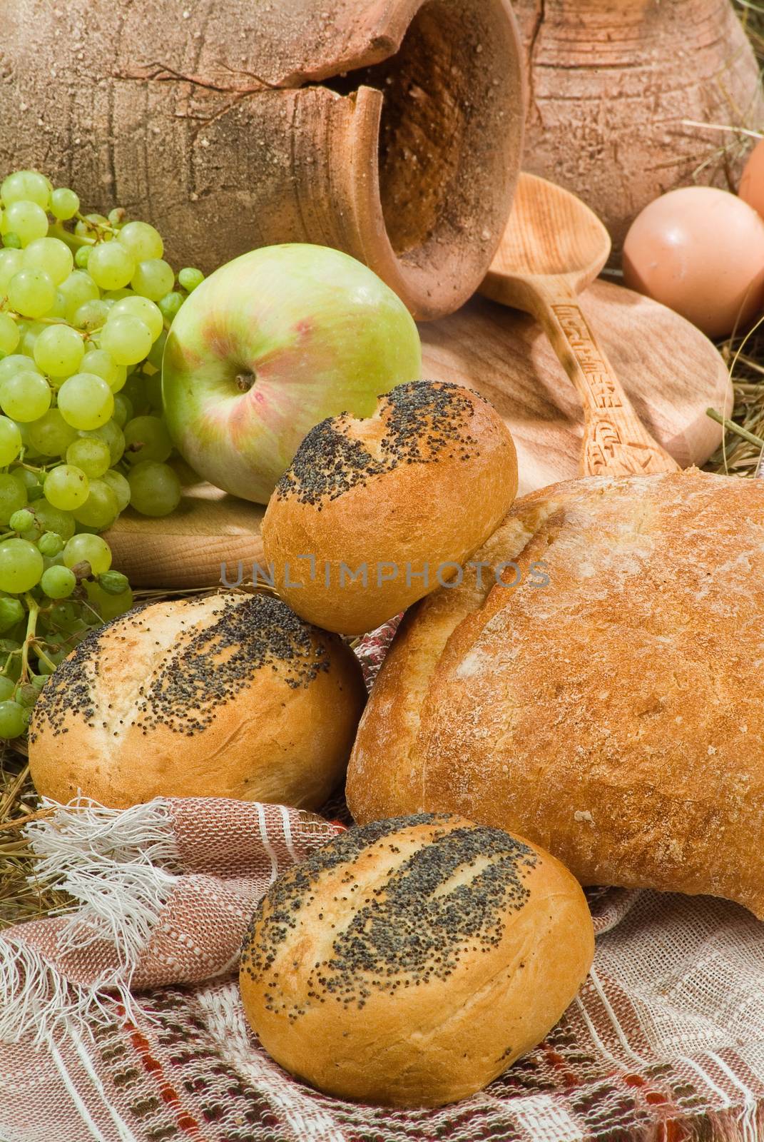 Different kinds of bread on a studio background
